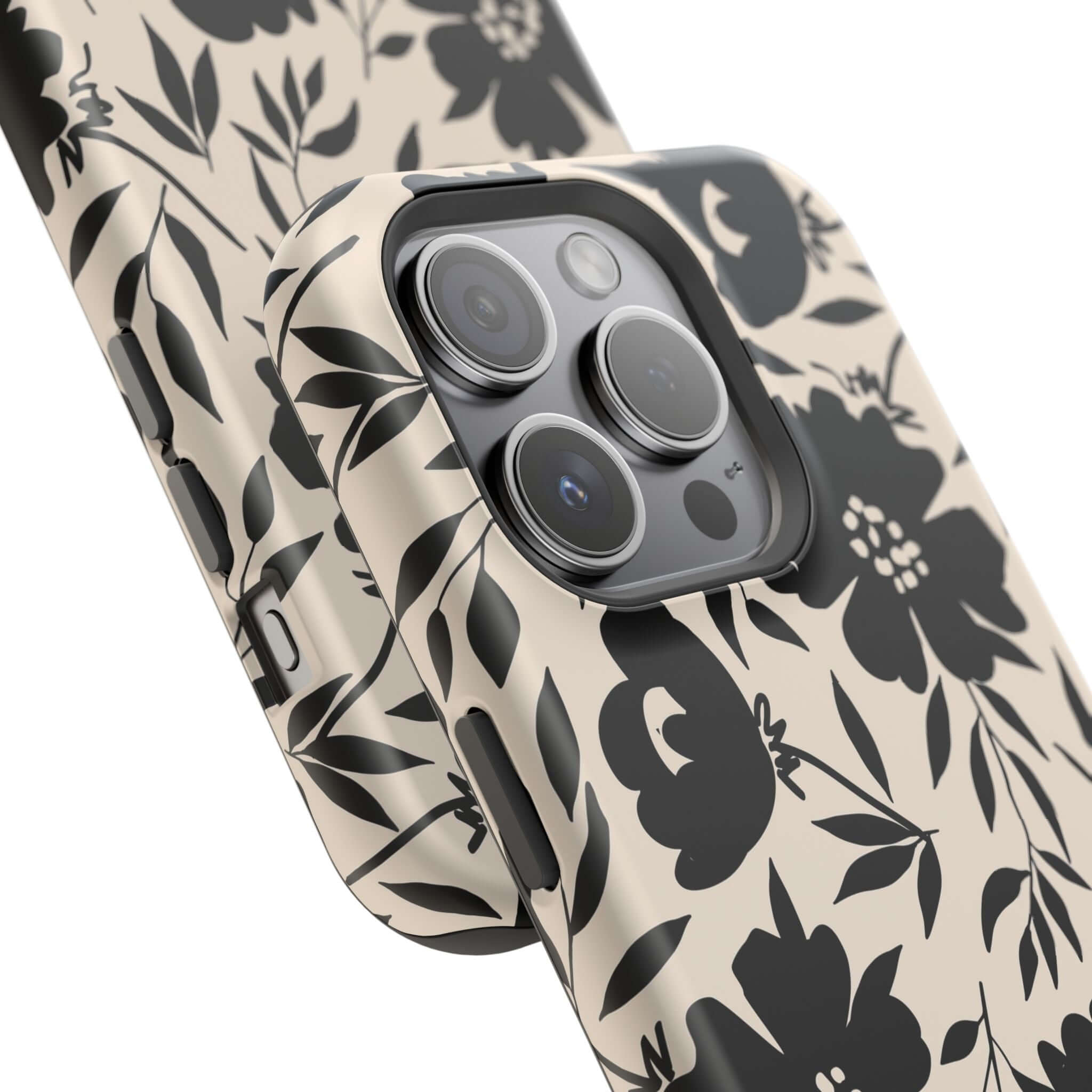 Black floral case on iPhone 16, showcasing Eclipse Garden design. Cute phone case with bold, adventurous style.