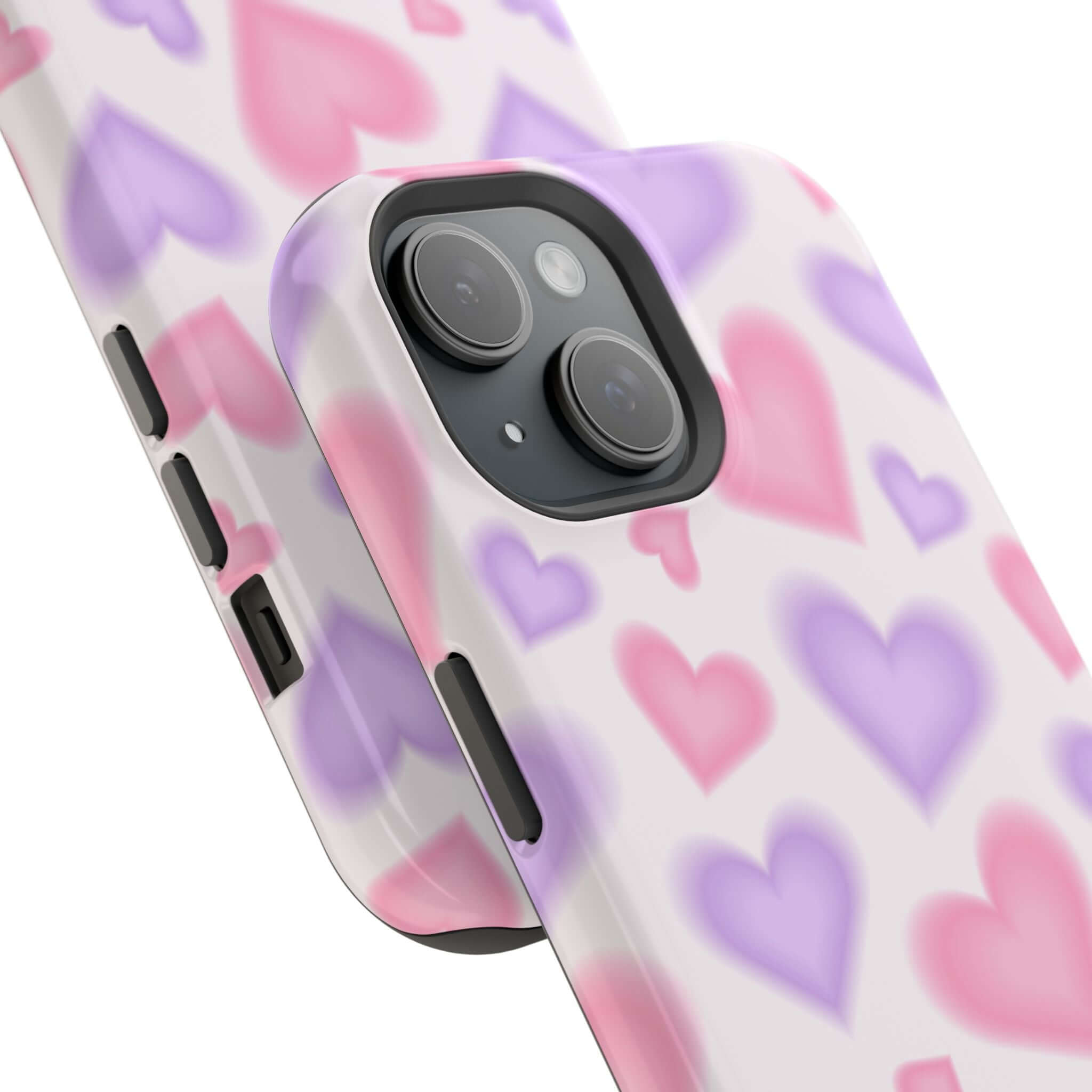 Cute phone cover showcasing pink and purple hearts design on an Apple iPhone case with MagSafe technology.