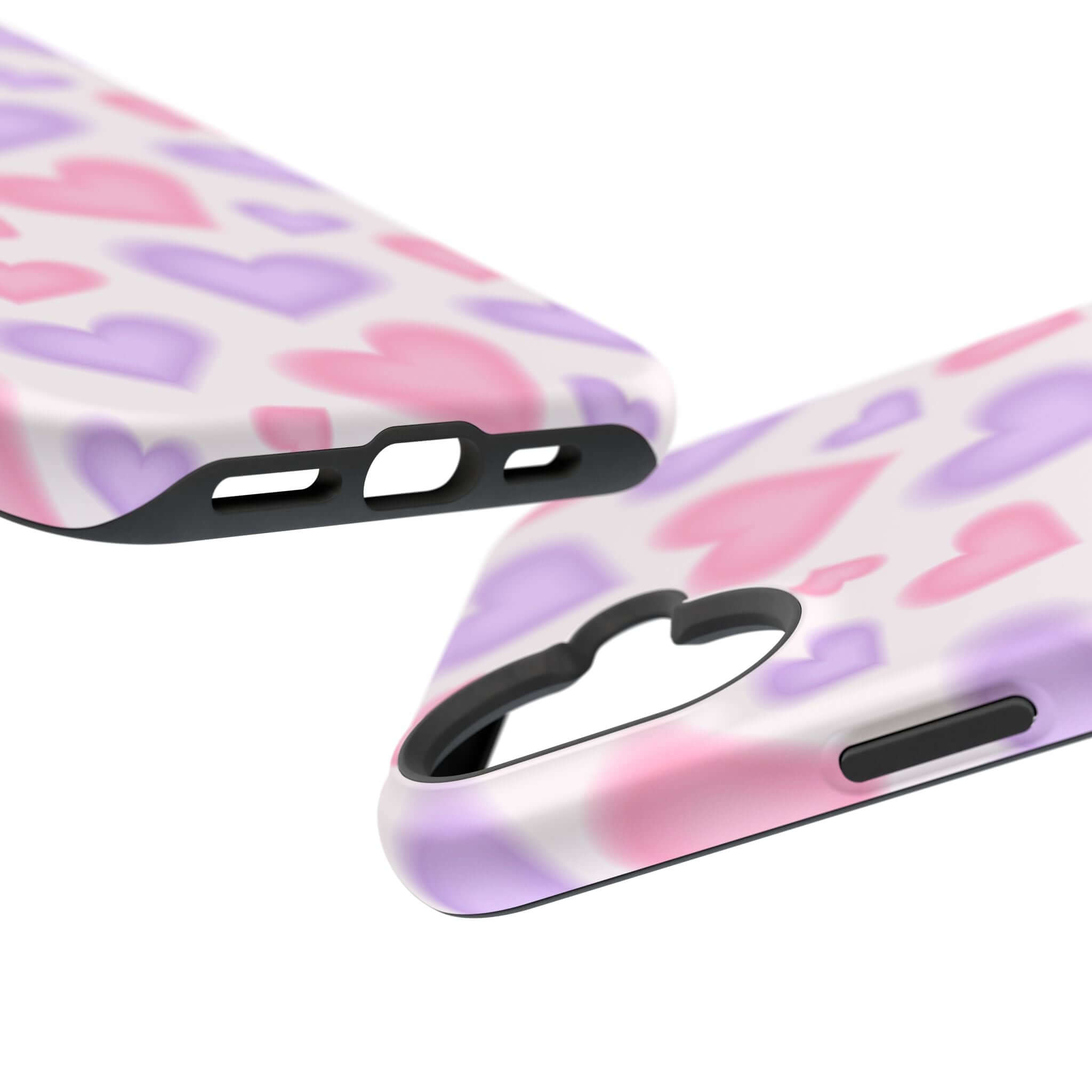 Cute phone cover with pink hearts design for Apple iPhone, showcasing MagSafe technology and playful style.