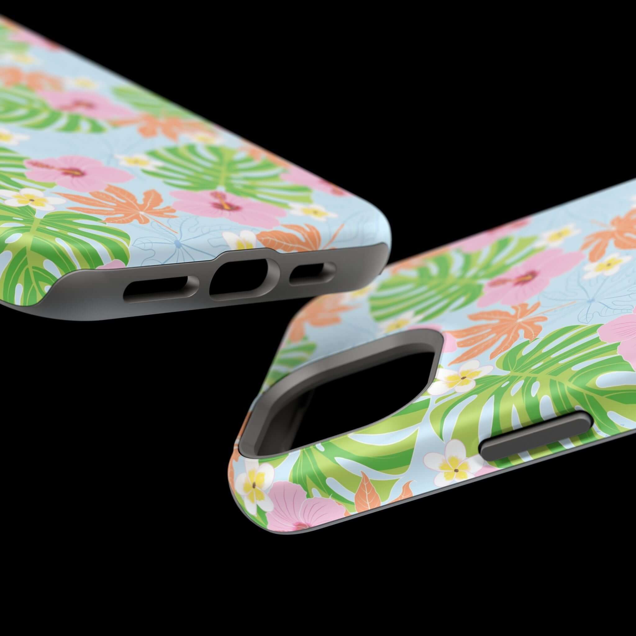 Island Hibiscus MagSafe iPhone 14 Pro case with a colorful tropical floral design against a black background