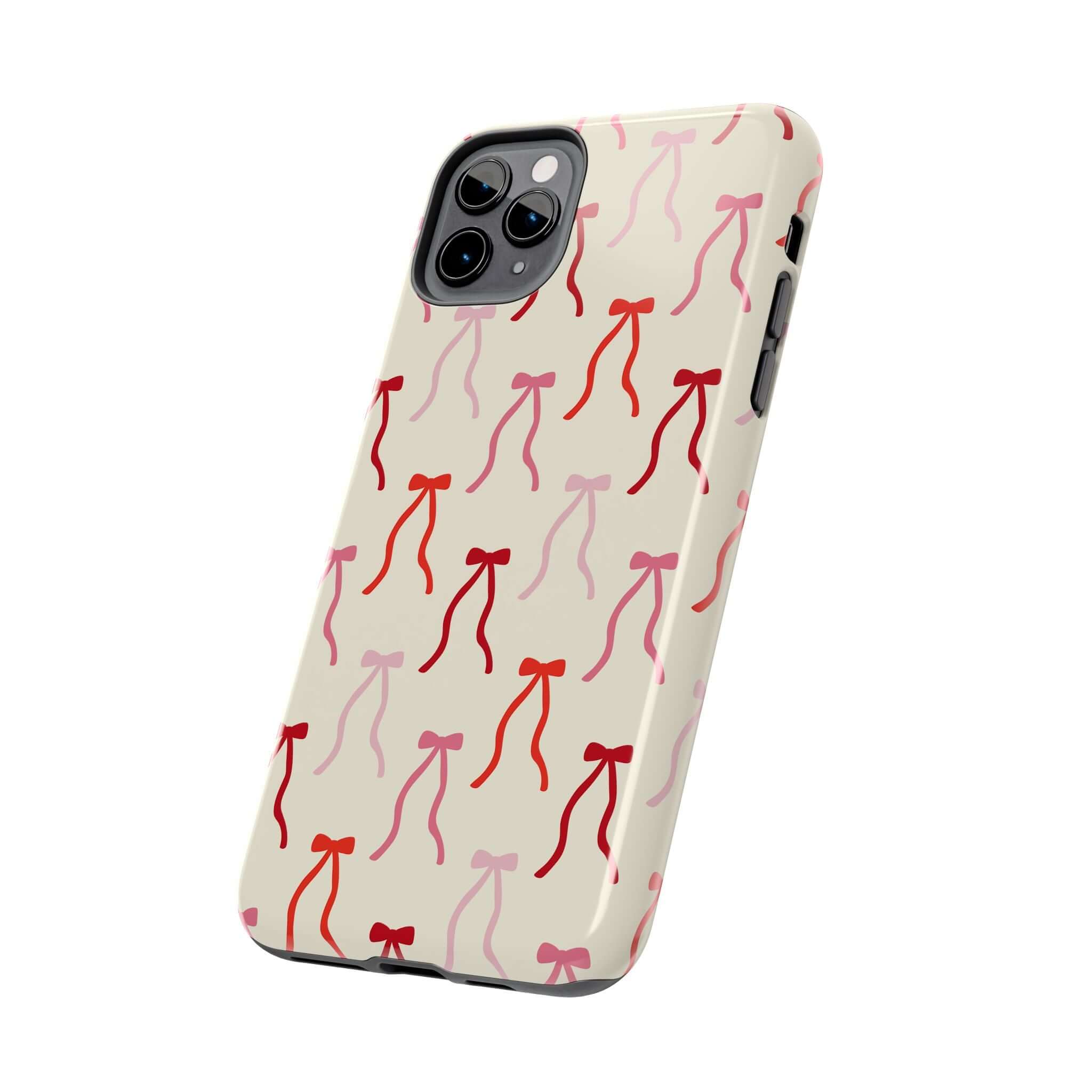 Cute Beige Coquette Phone Case for iPhone 16 with Red Bow Design