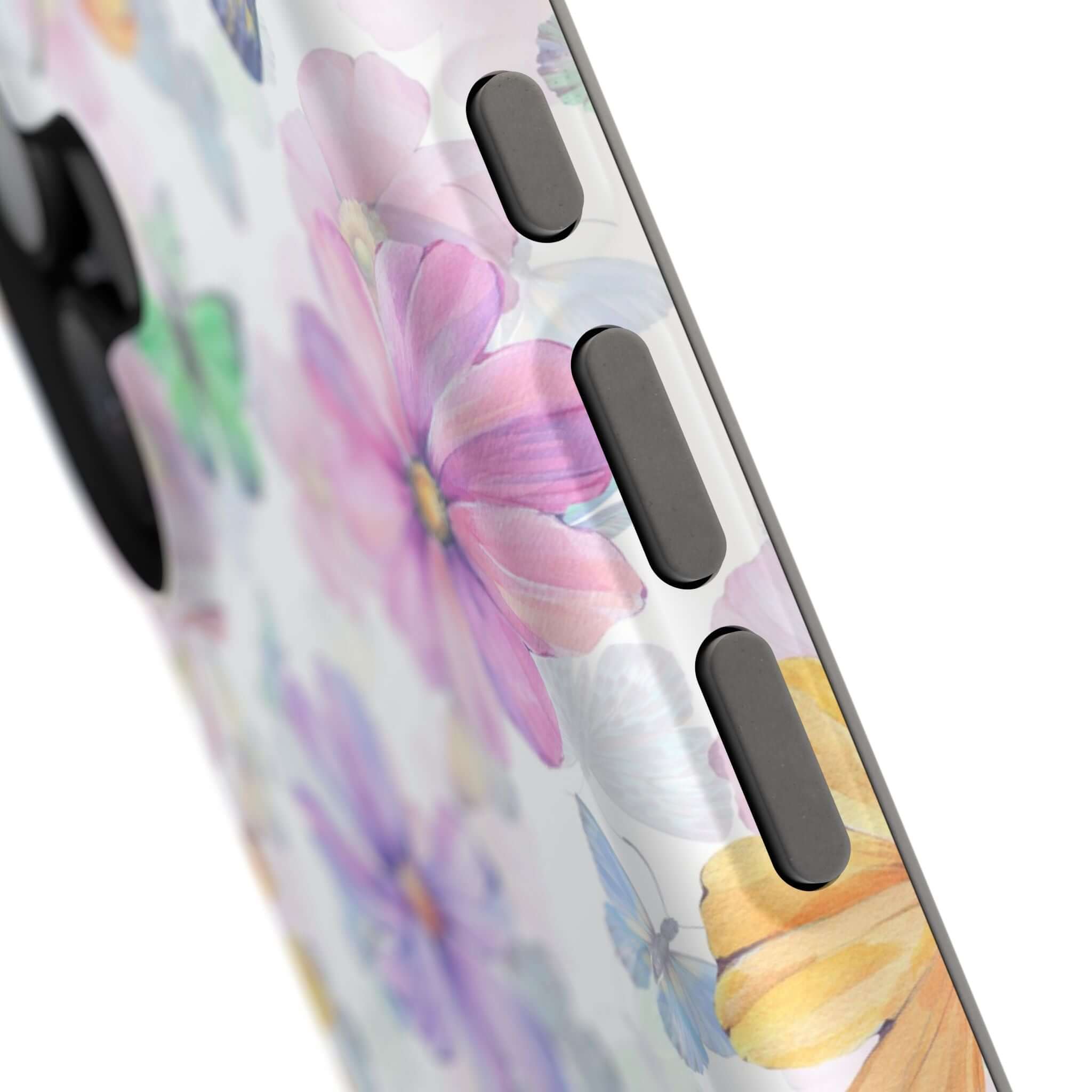 Close-up of Fluttering Blooms Watercolor Butterfly iPhone Case, featuring colorful floral and butterfly designs on a MagSafe compatible case.