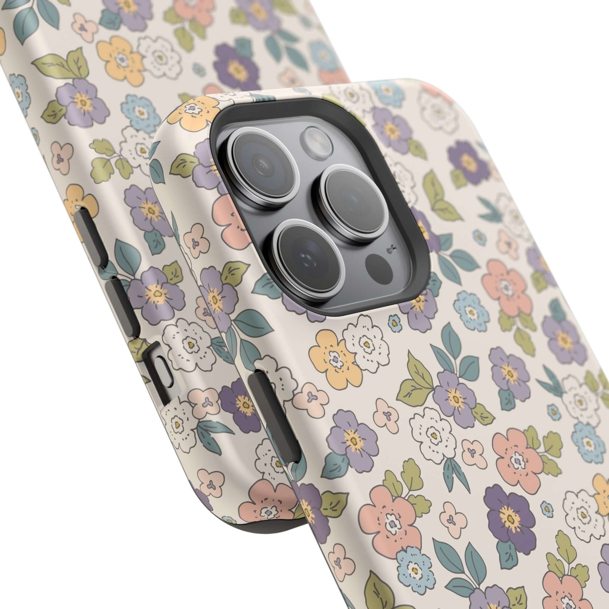 Colorful Ditsy Daisies iPhone case, perfect beachy accessory, showcasing cute floral design and MagSafe compatibility.