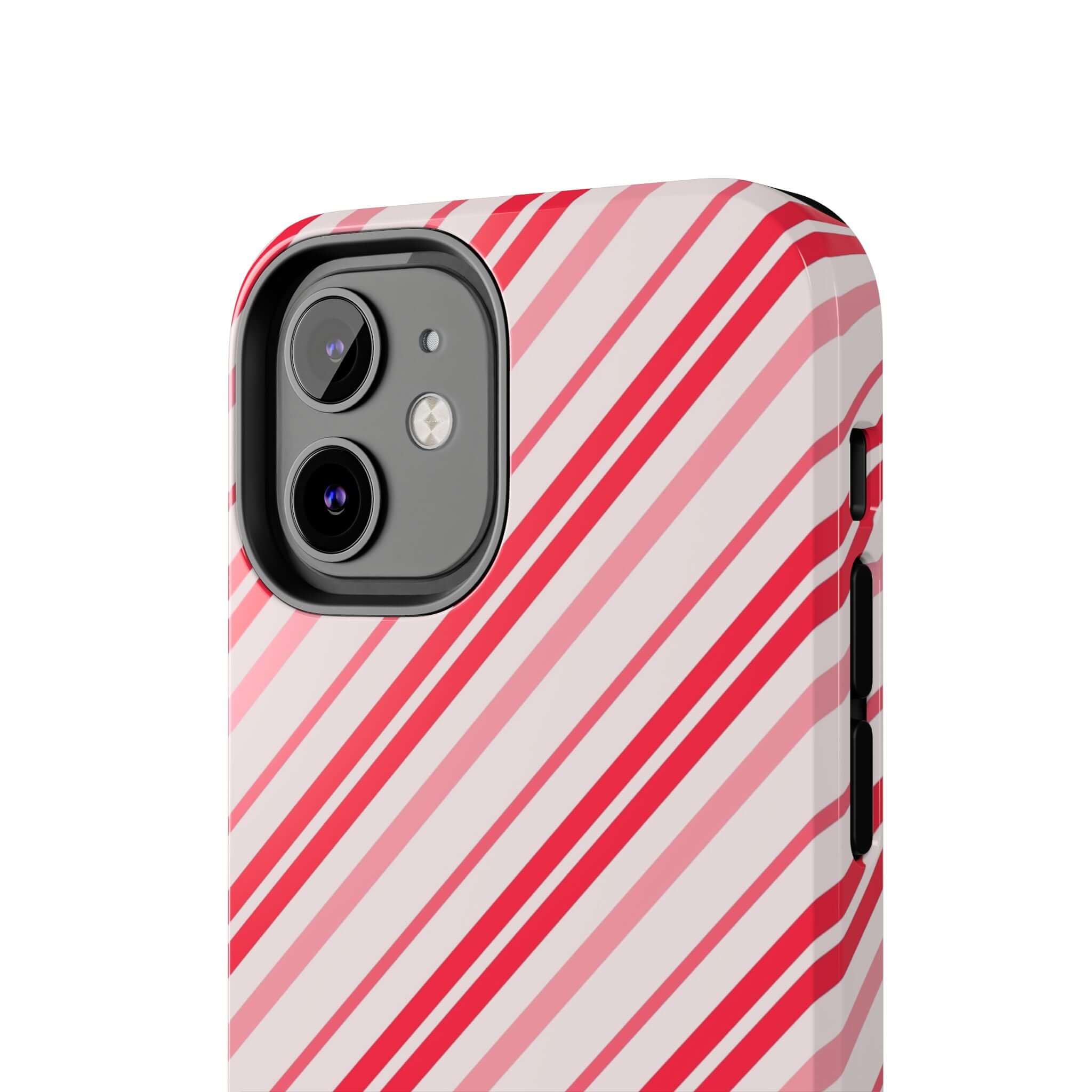 Cute iPhone case with red and white candy cane stripes, perfect holiday phone case design for Christmas style and personalization.