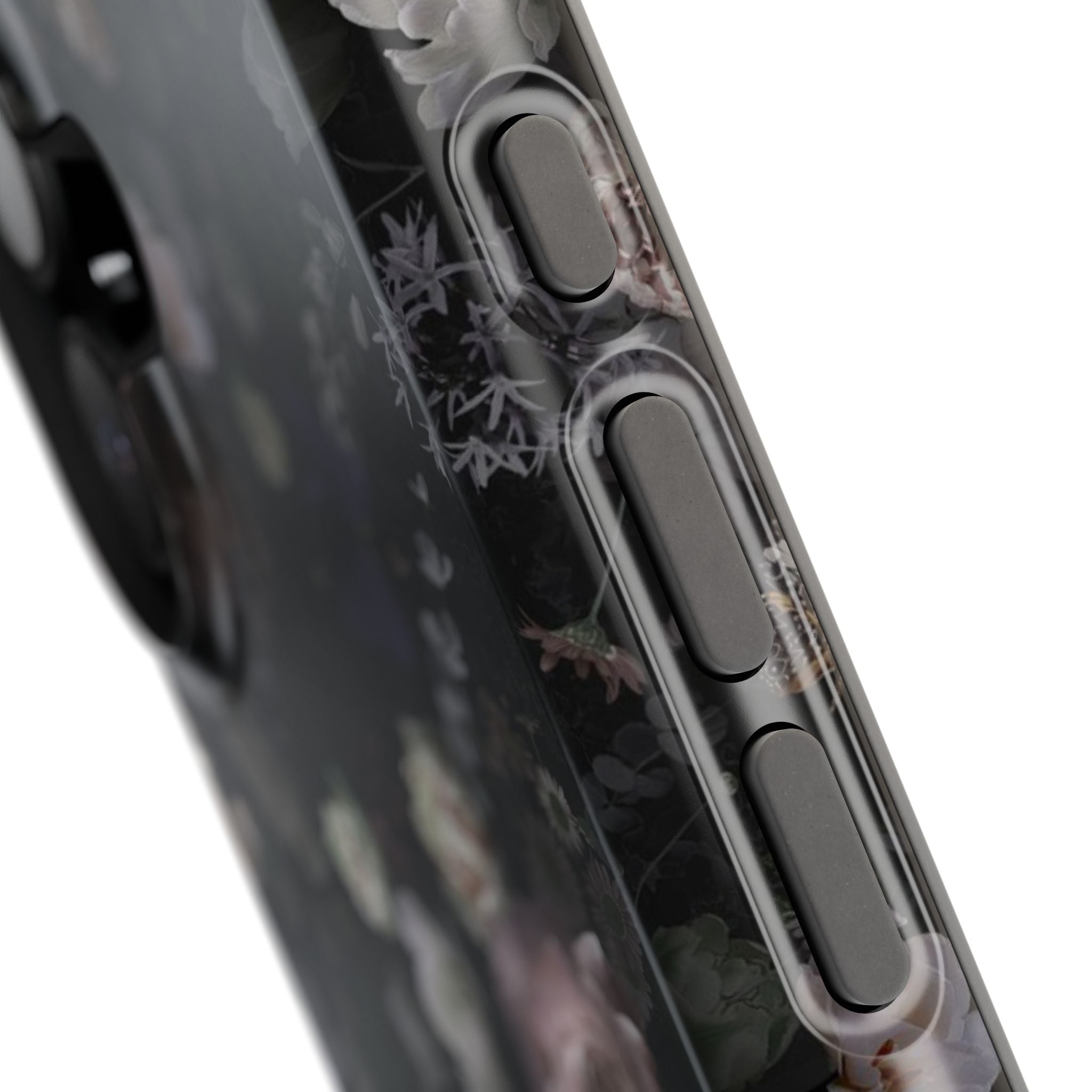 Close-up of Midnight Curse MagSafe iPhone Case with black floral design detailing, showcasing cute and trendy phone cover buttons.