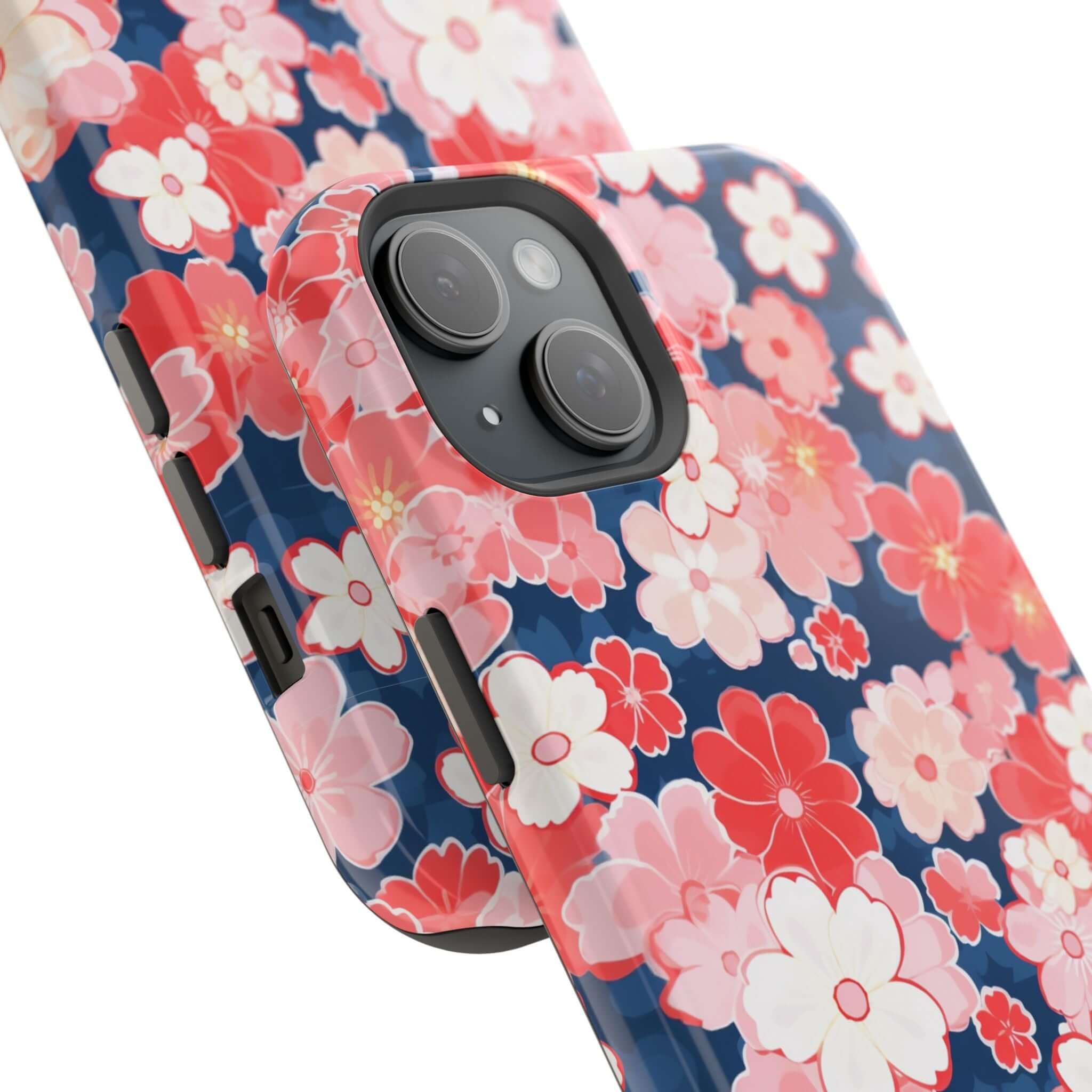 Pink floral iPhone 14 Pro Max case showcasing a vibrant phone cover with red and white flowers against a blue background.