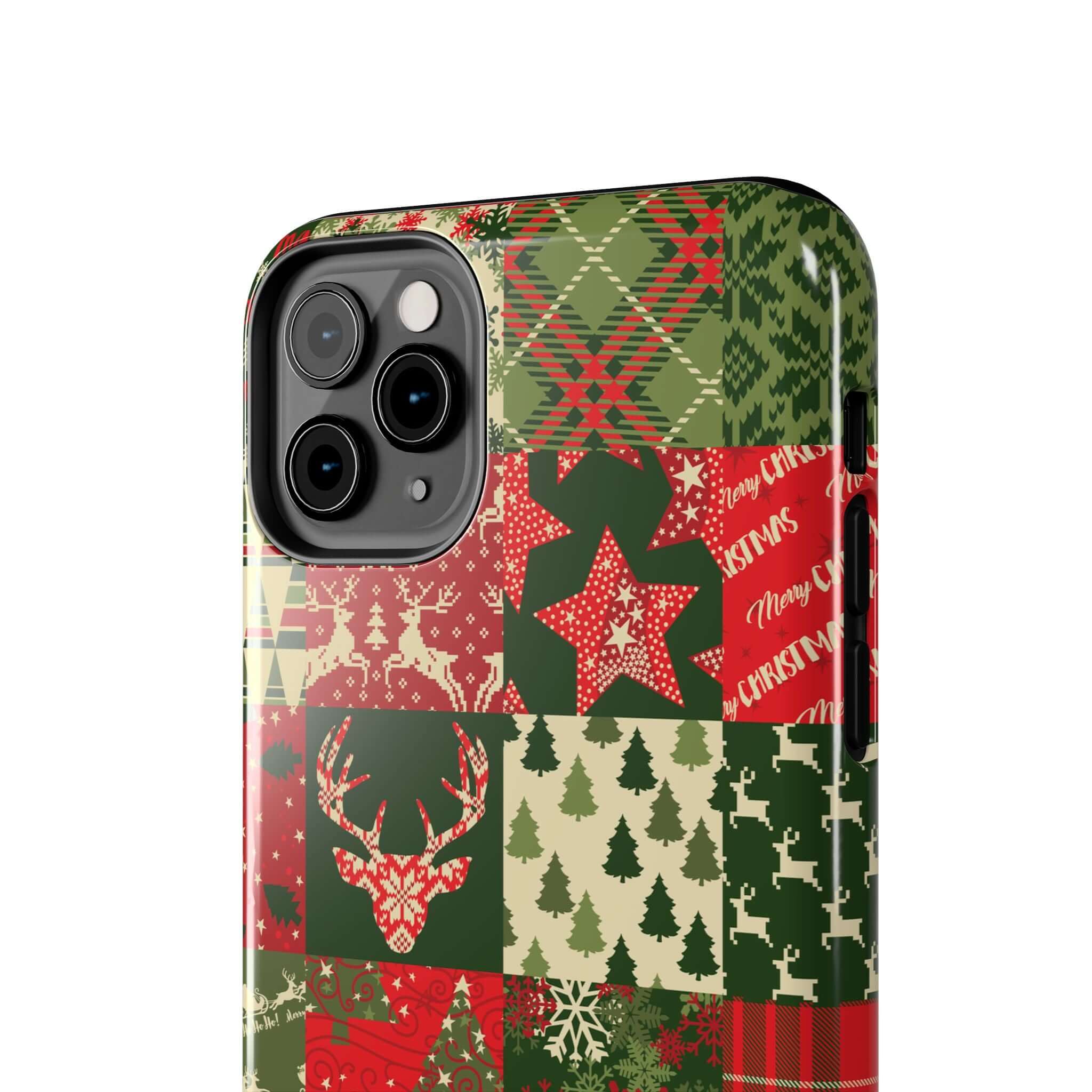 Festive green holiday phone case with Christmas trees, reindeer, and stars in a patchwork design. Cute iPhone case by Cozy Quiltmas.