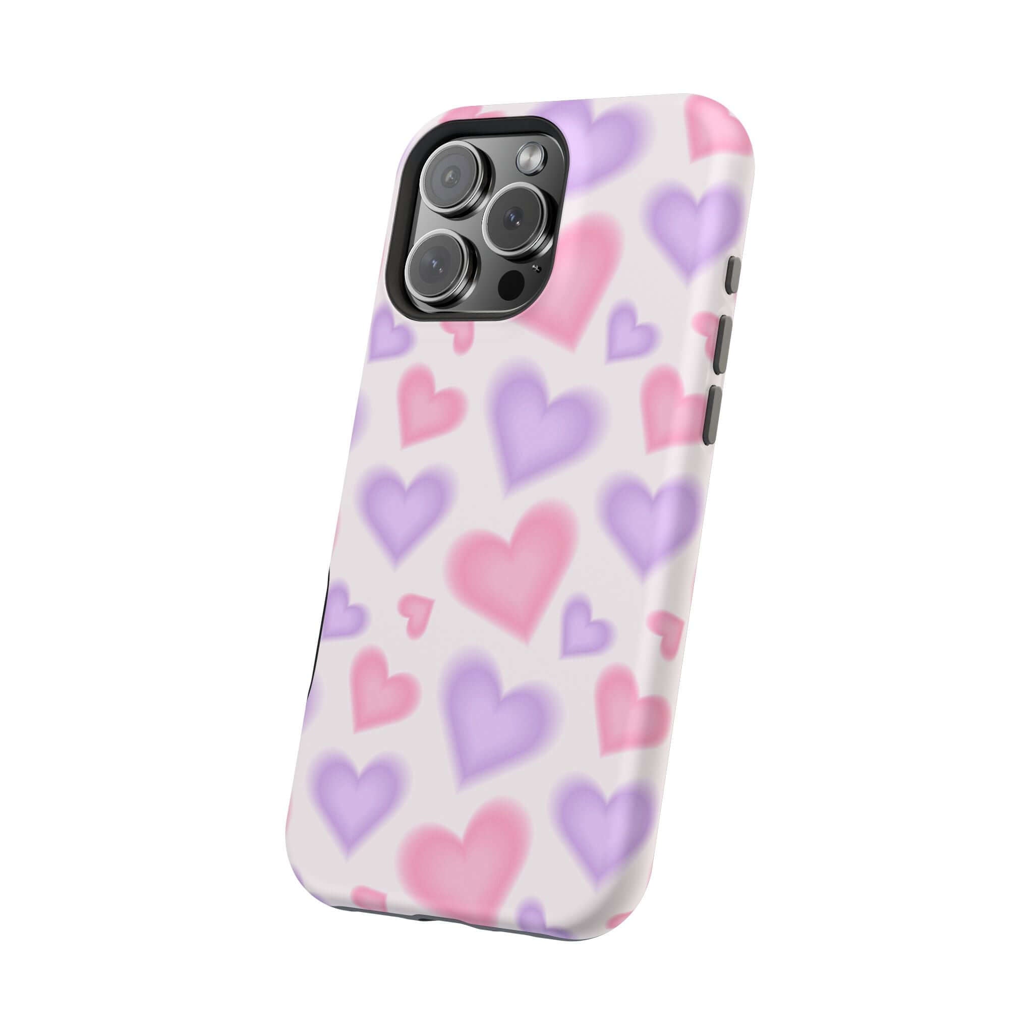 Cute phone cover featuring blurred pink and purple hearts on a stylish Apple iPhone case, perfect for adding love to your device.