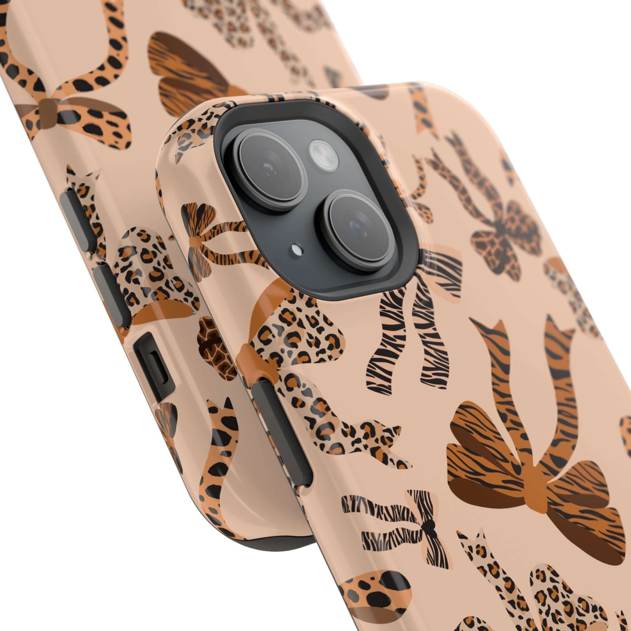 Colorful iPhone case with leopard pattern and cute bows, featuring Safari Coquette design for a playful and stylish look.