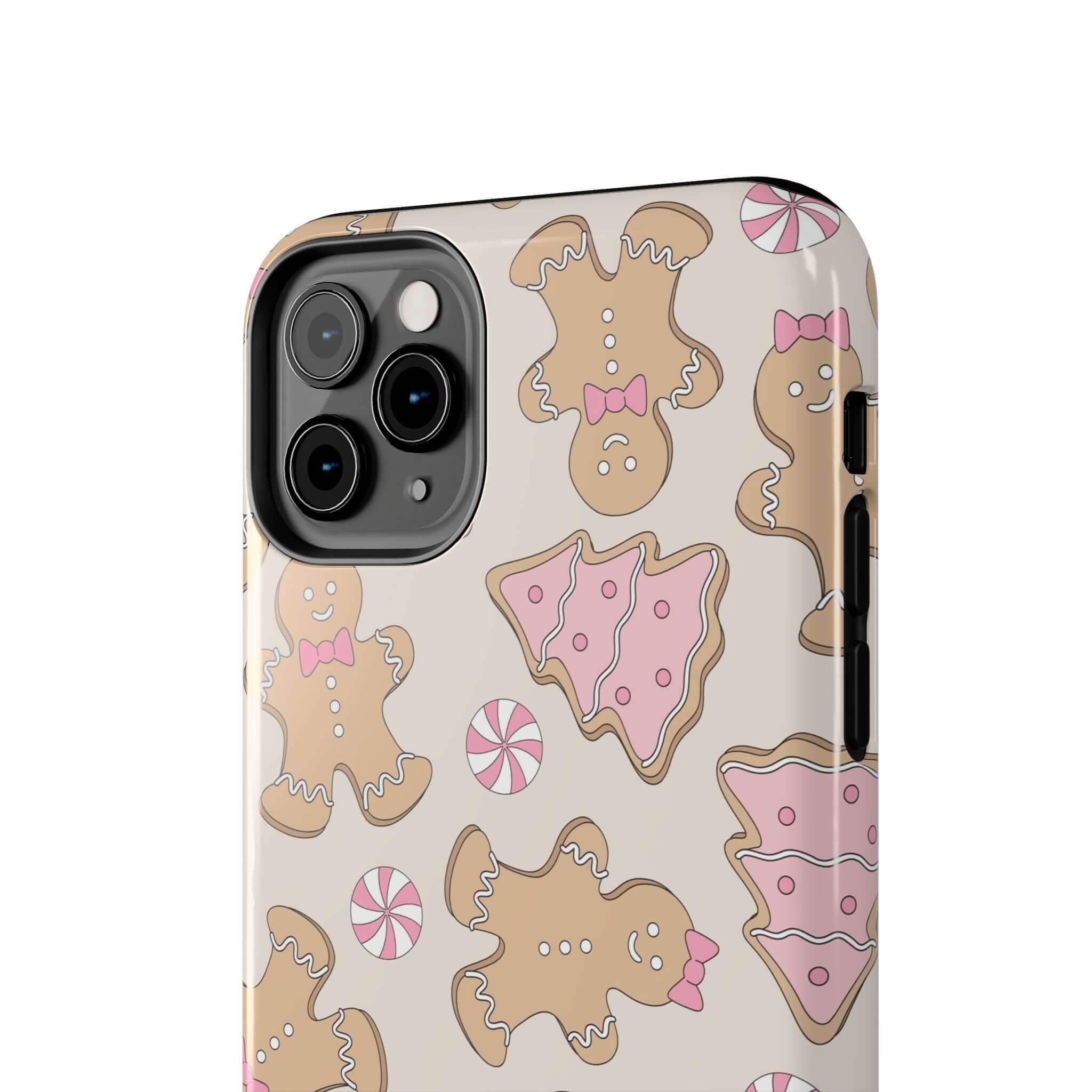 Cute Gingerbread Girlie iPhone case with festive holiday design of gingerbread cookies and pink accents, perfect for Christmas gifting.