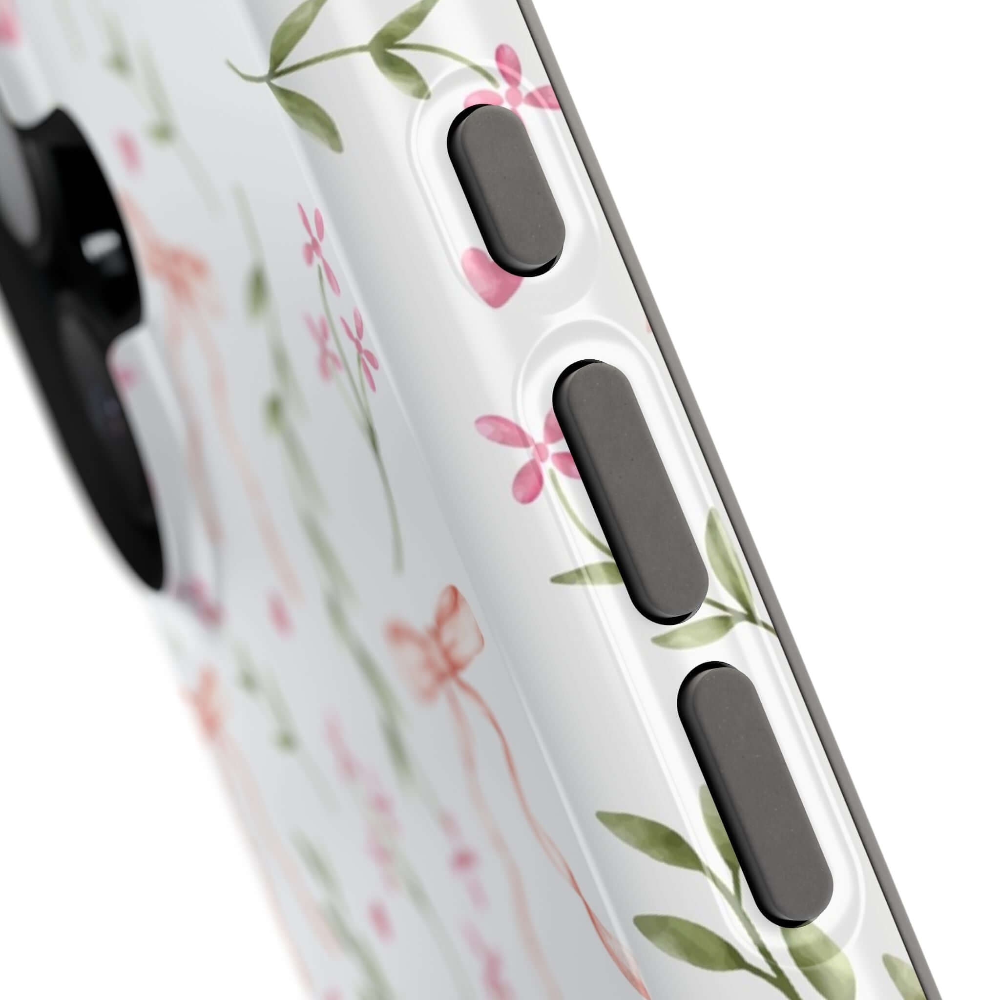 Close-up of Darling Daydream Pink Coquette Case, a MagSafe iPhone cover with floral design and charming bows for a cute phone look.