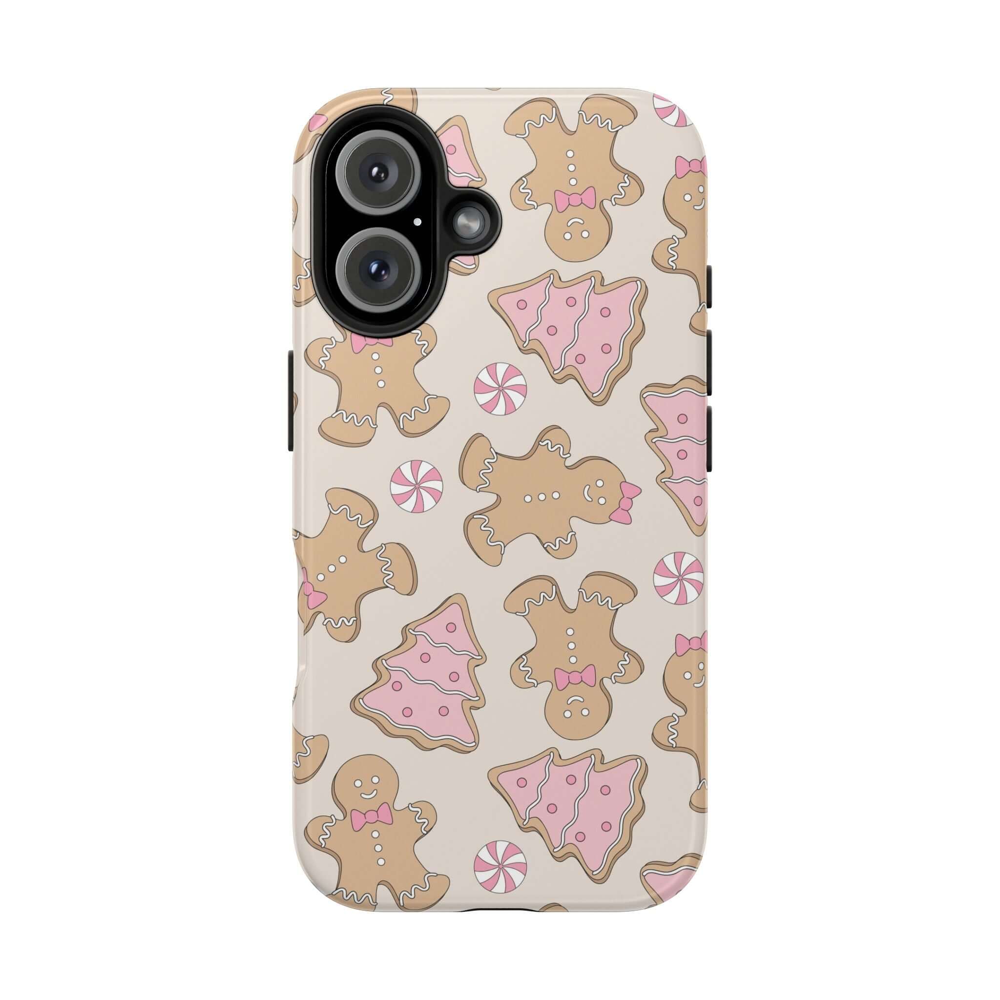 Cute Christmas gingerbread phone case with pink and beige holiday design. Festive iPhone cover for seasonal cheer and gift-giving.