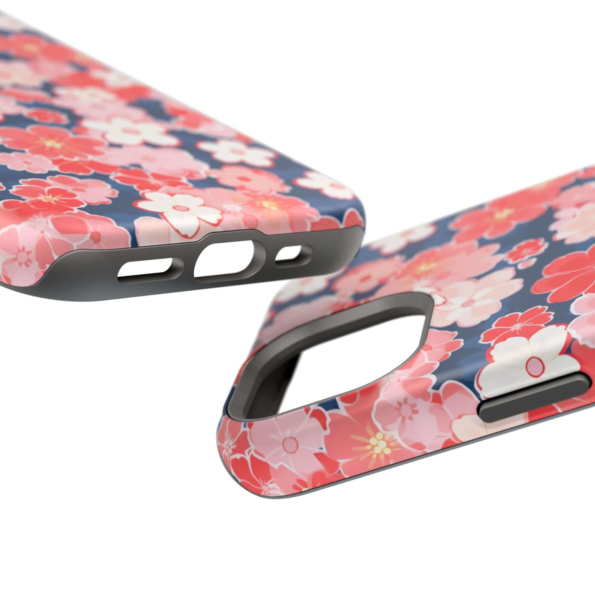 Floral phone case for iPhone 14 Pro Max with pink and white flowers on a dark background showing camera and button cutouts.