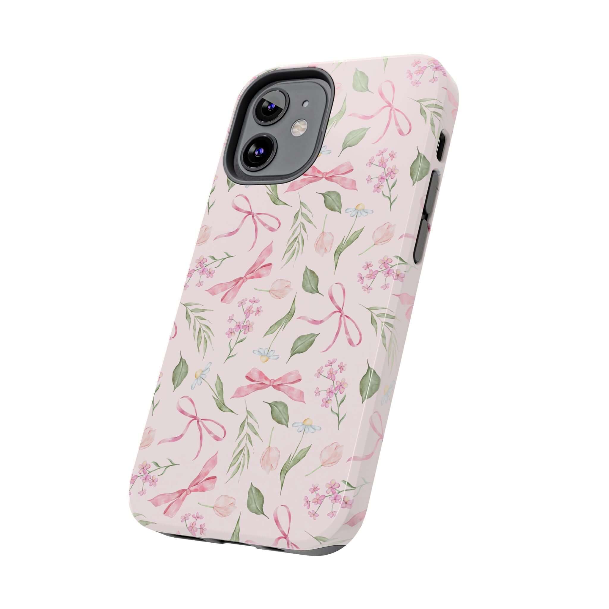 Cute pink iPhone case with bow design, compatible with iPhone 14 and iPhone 15, perfect for adding playful flair and protection to your phone.