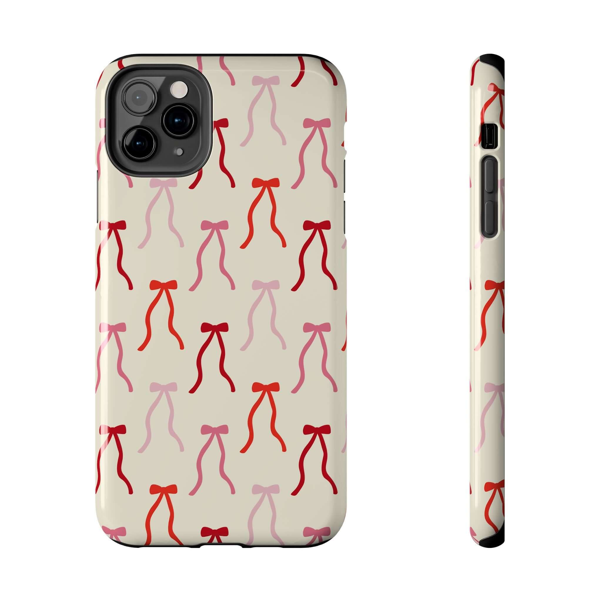 Cute beige phone case for iPhone 16 with vibrant red coquette bow design, adding playful style and protection.