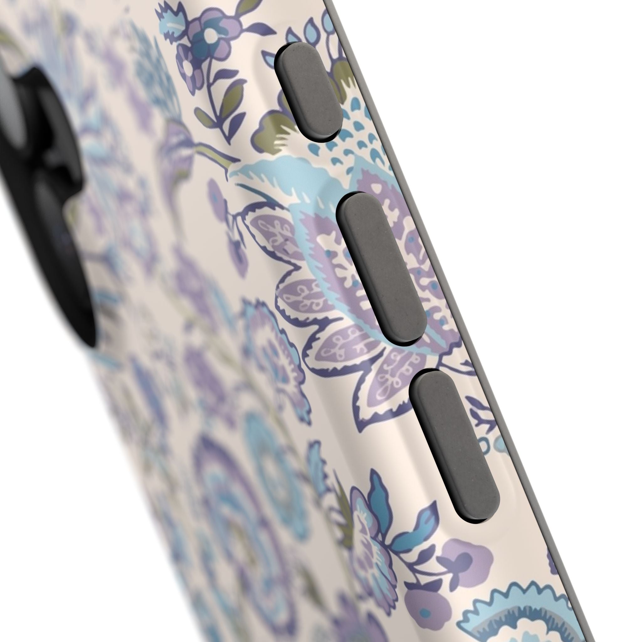 Blue CottageCore floral MagSafe iPhone case with whimsical nature design, close-up view of cute phone cover buttons.