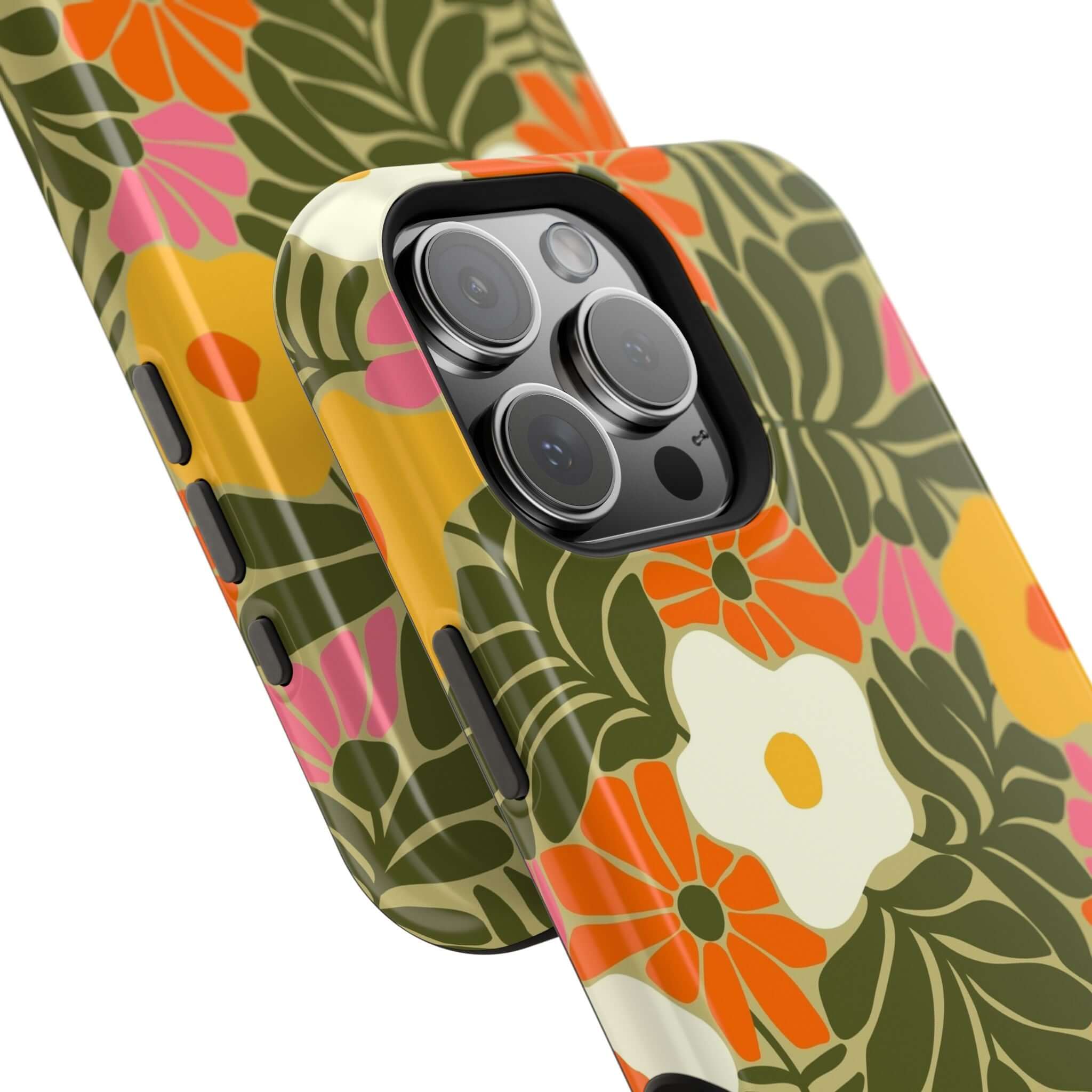 Colorful retro floral iPhone case showcasing cute phone cover design with vibrant tropical flowers and MagSafe compatibility.