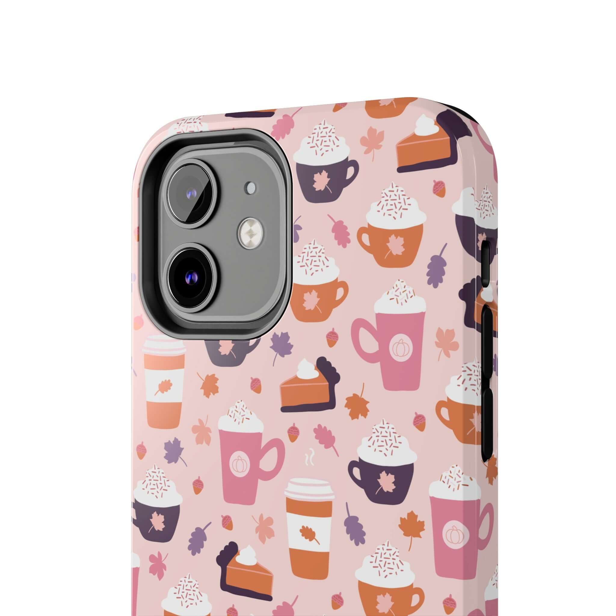 Cute iPhone 15 case with PSL fall drinks design, featuring coffee cups and pumpkin pie on a pink background for pumpkin spice lovers.