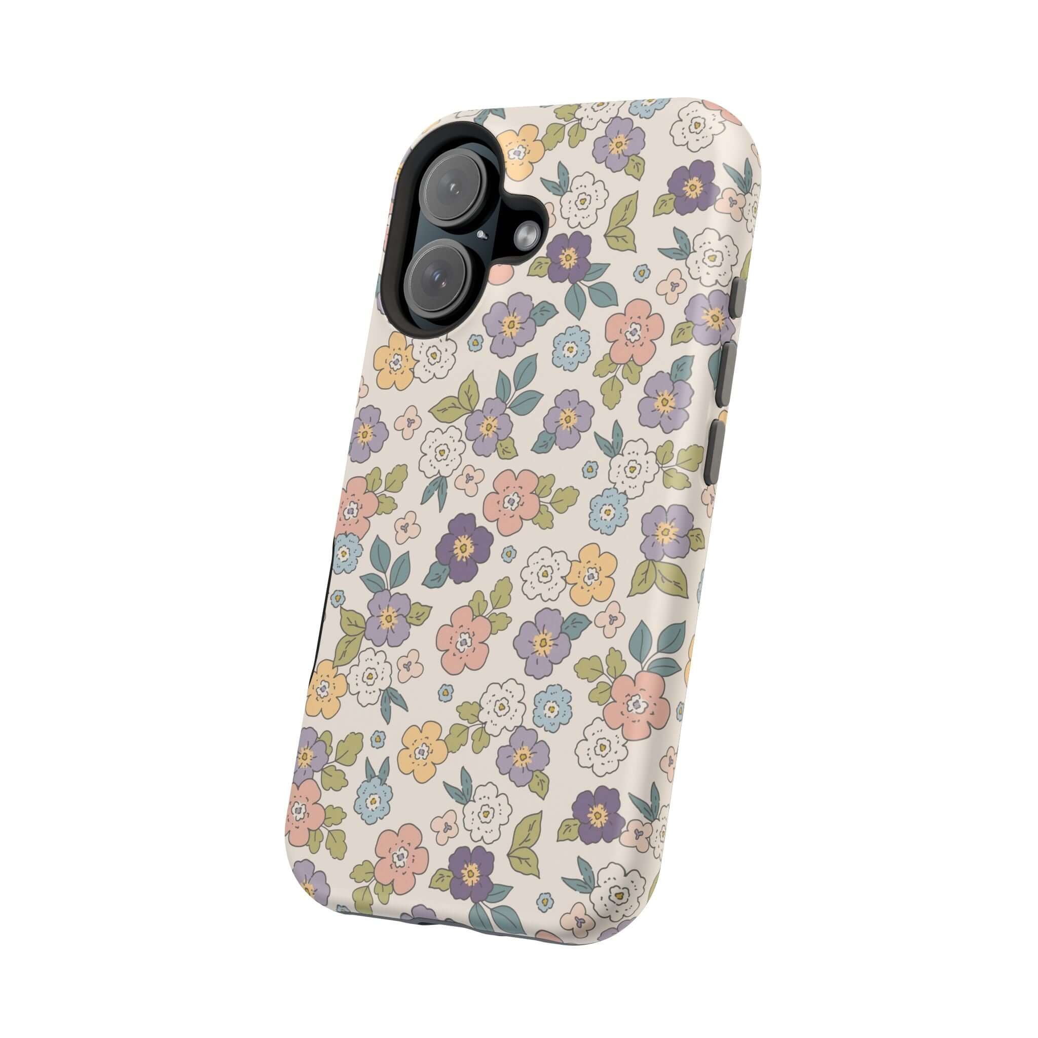 Colorful Ditsy Daisies iPhone case showcasing cute floral design and MagSafe compatibility for stylish phone users.