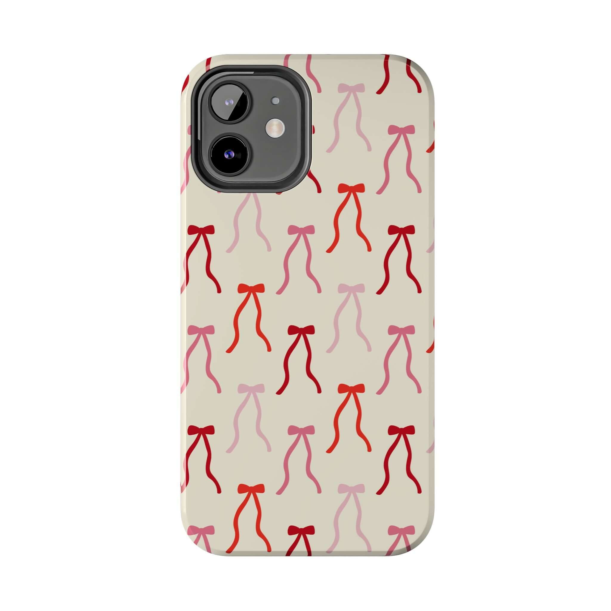 Beige Coquette Case with red and pink bow design, perfect cute phone case for iPhone 16 users looking to protect phones in style.