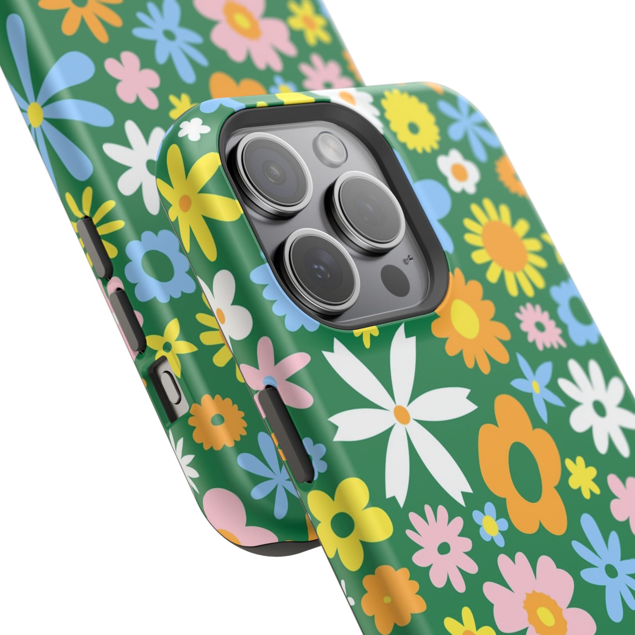 Vibrant hippie floral MagSafe iPhone case with colorful flowers on a green background. Cute floral phone cover for style and protection.