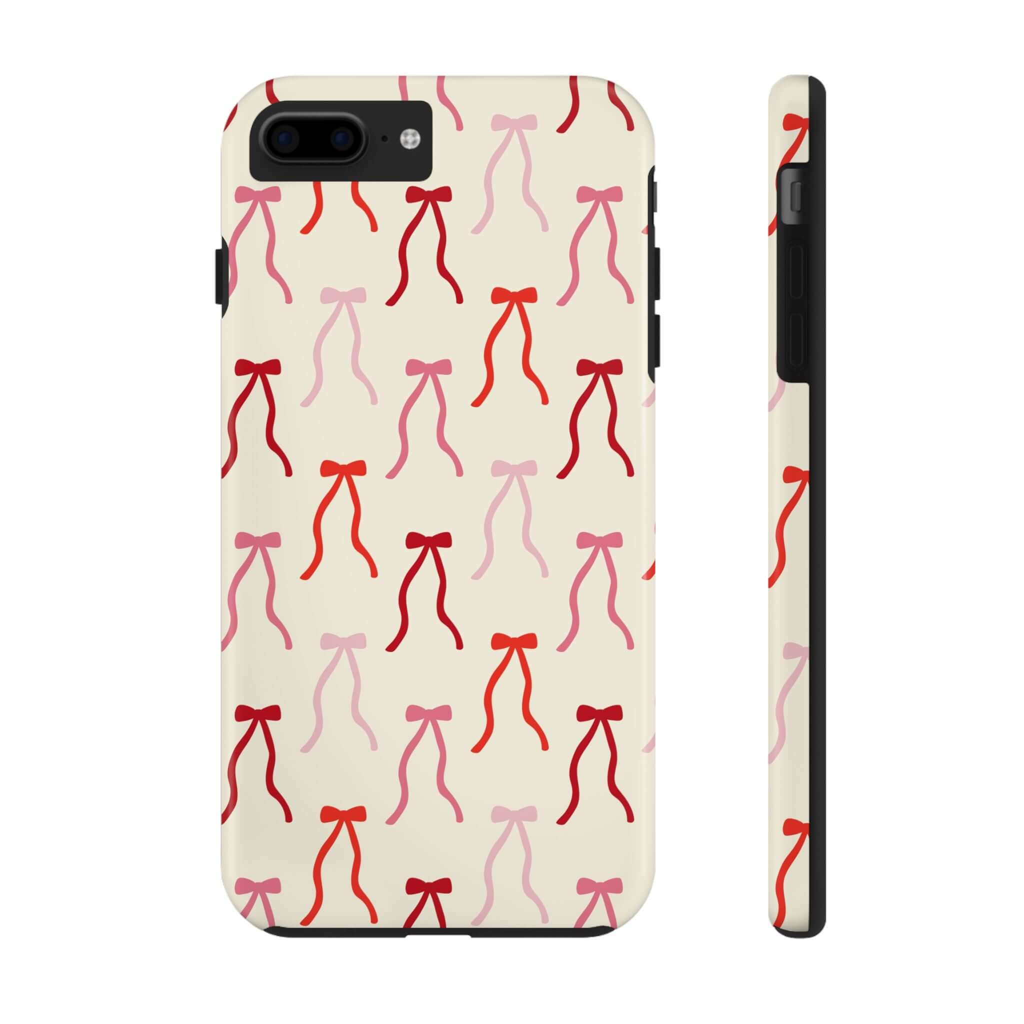 Beige coquette phone case with red and pink bow design, compatible with iPhone 16, adds a cute and playful touch.