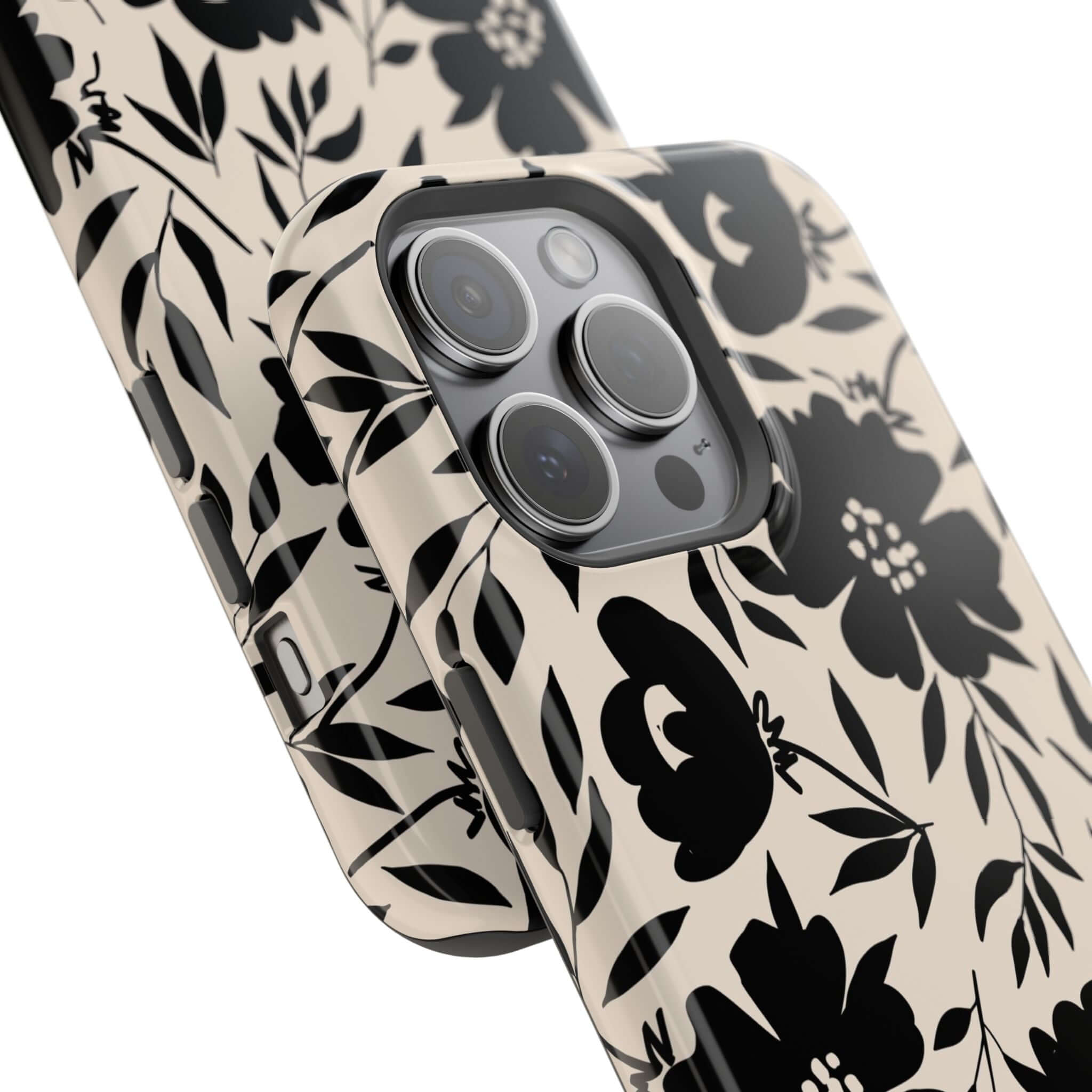 Black floral phone case for iPhone 16, Eclipse Garden design, cute and unique accessory.