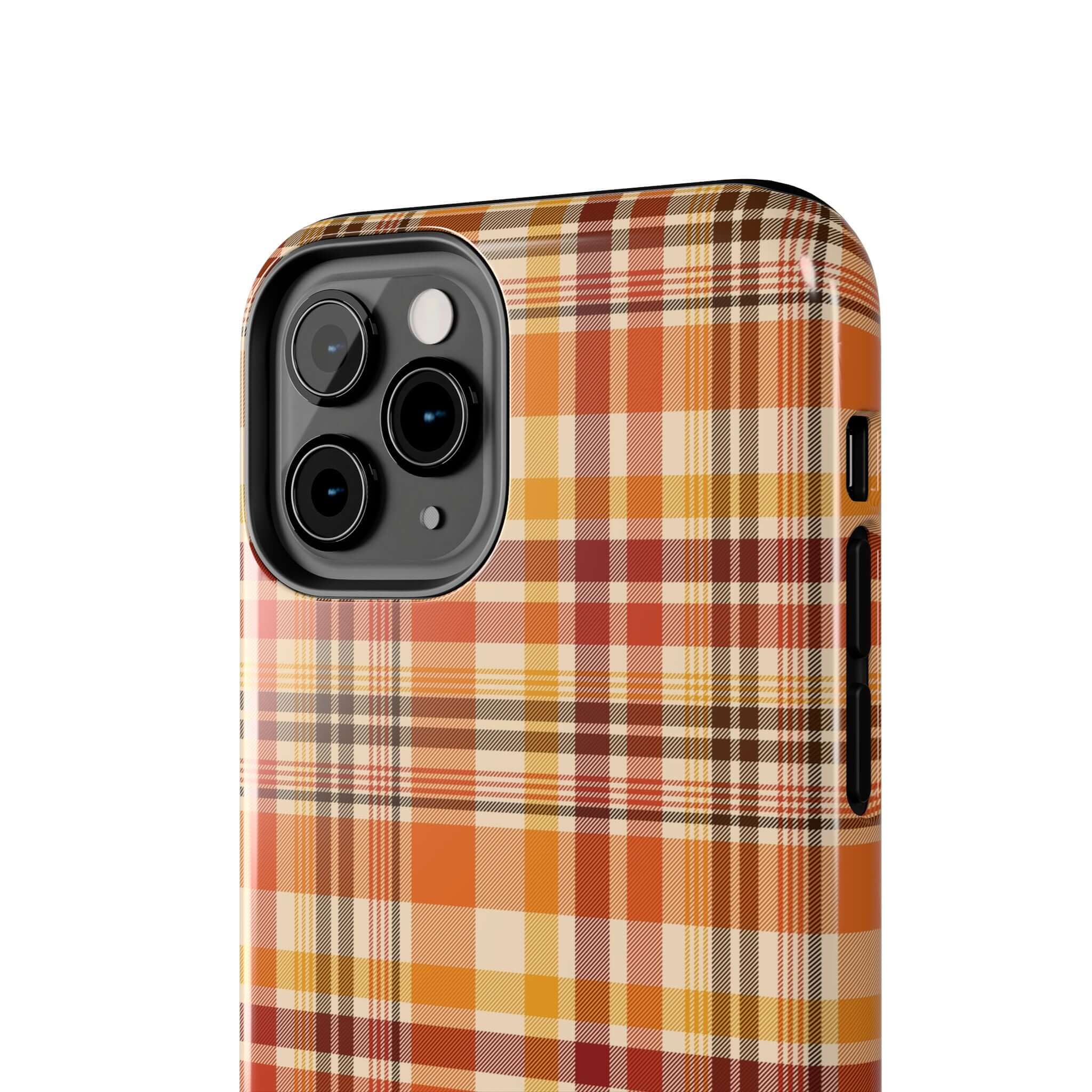 Autumn Air Fall Plaid Case with orange, yellow, and red hues on an iPhone, perfect Halloween and fall iPhone case. Cute and stylish protection.