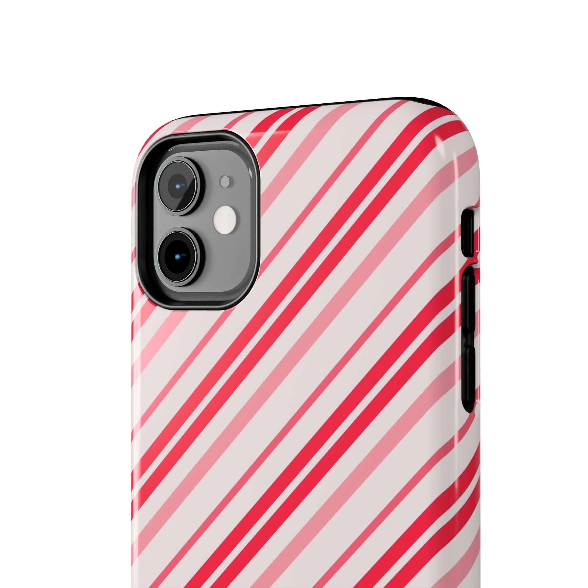 Cute iPhone case with red and white candy cane stripes, perfect for the holidays. Custom phone case design for festive style.