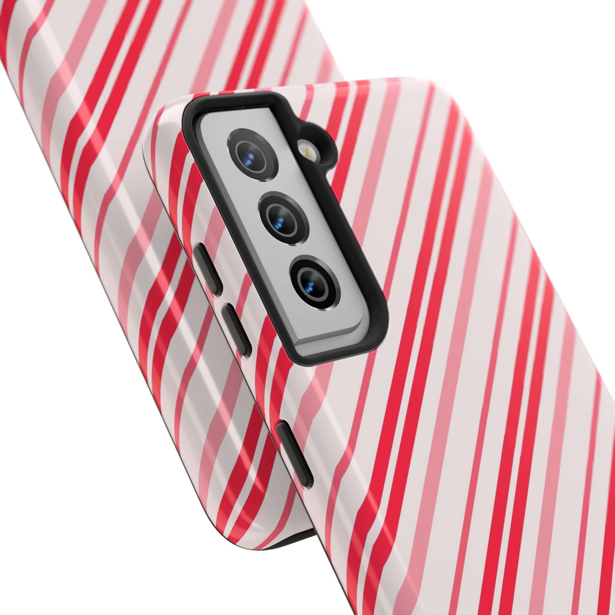 Festive red and white striped holiday phone case with candy cane design, perfect cute iPhone case for personalized Christmas style.