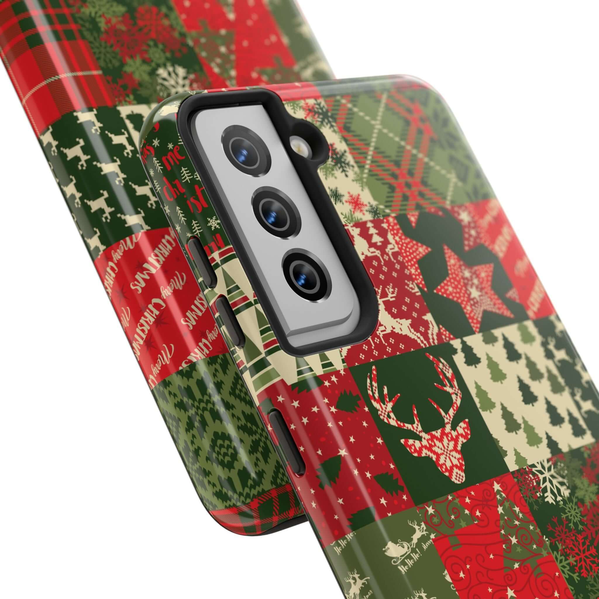 Cute iPhone case with green holiday quilt pattern, featuring Christmas trees, reindeer, and festive designs. Cozy Quiltmas phone case.