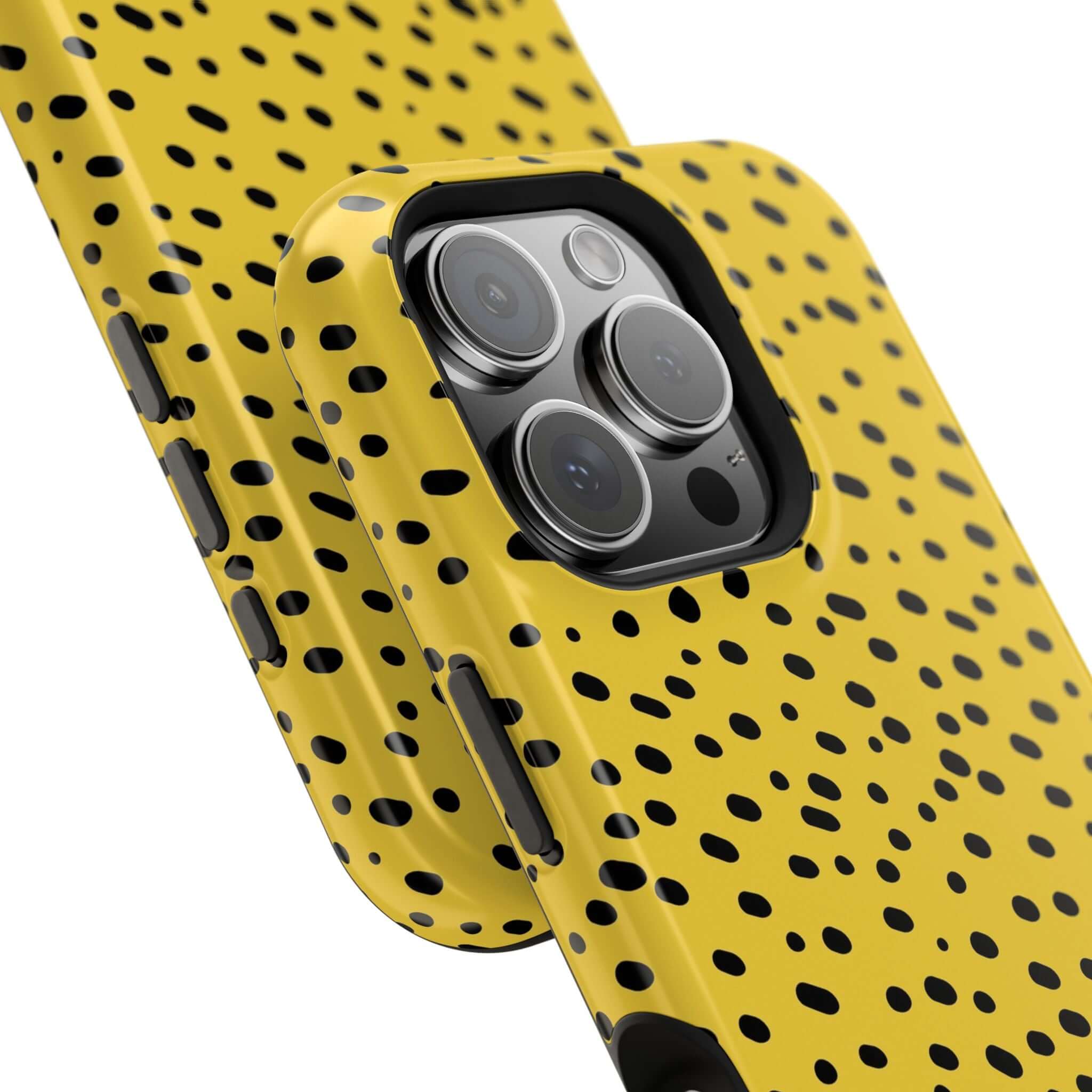 Colorful iPhone case with bold cheetah spots design, featuring a vibrant yellow MagSafe-compatible case for cute and abstract style.