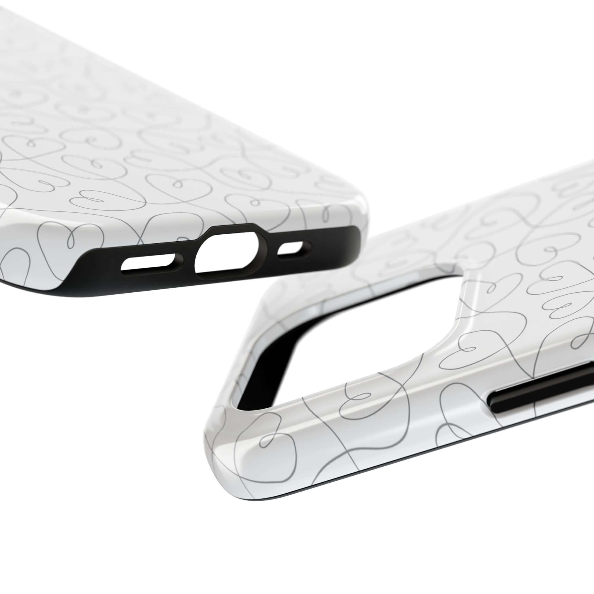 Abstract heart designs on a silver phone case for iPhone 14 Pro Max. Perfect cute phone case for weddings and brides.