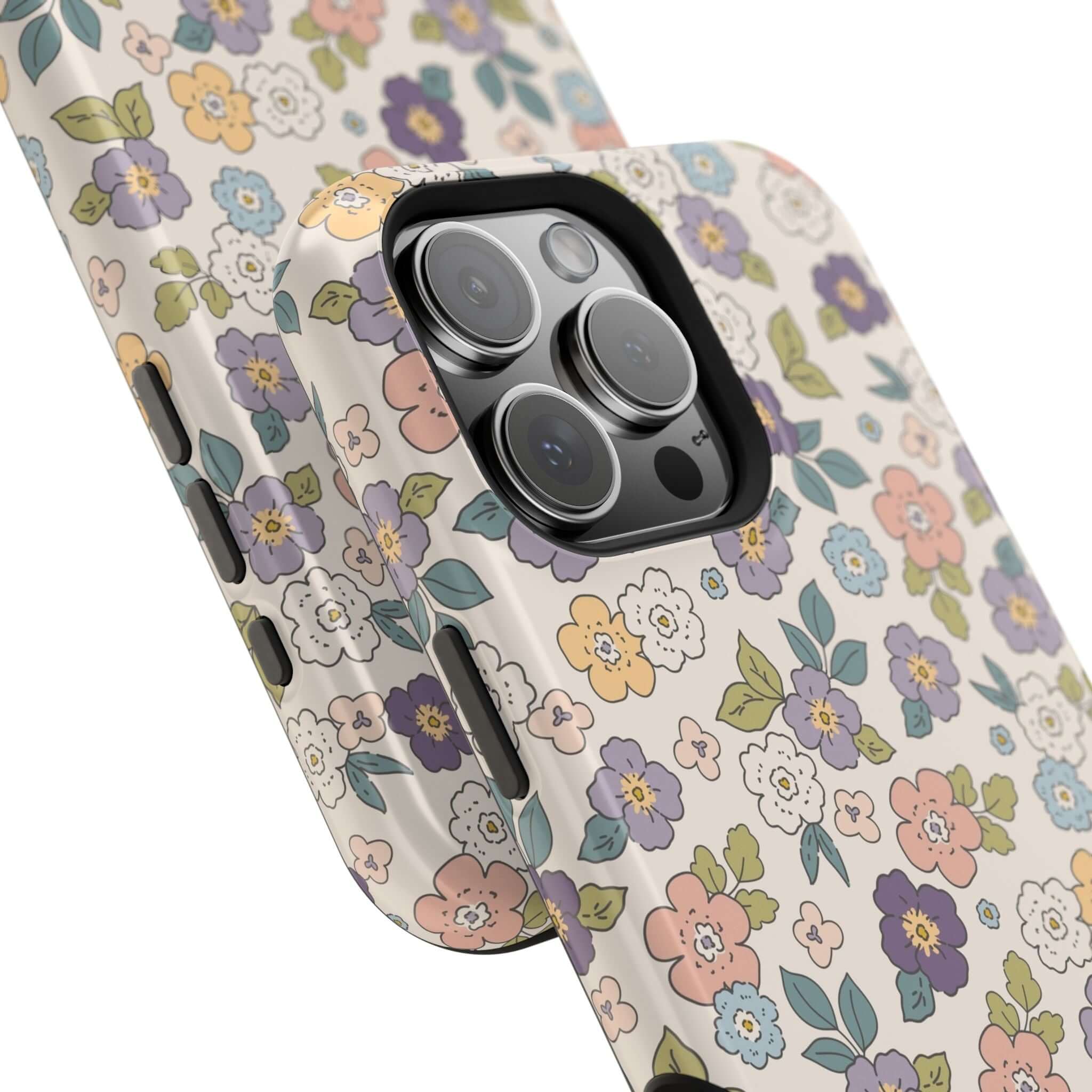 Colorful Ditsy Daisies iPhone case showcasing vibrant floral design, perfect for stylish phone users and MagSafe compatible.