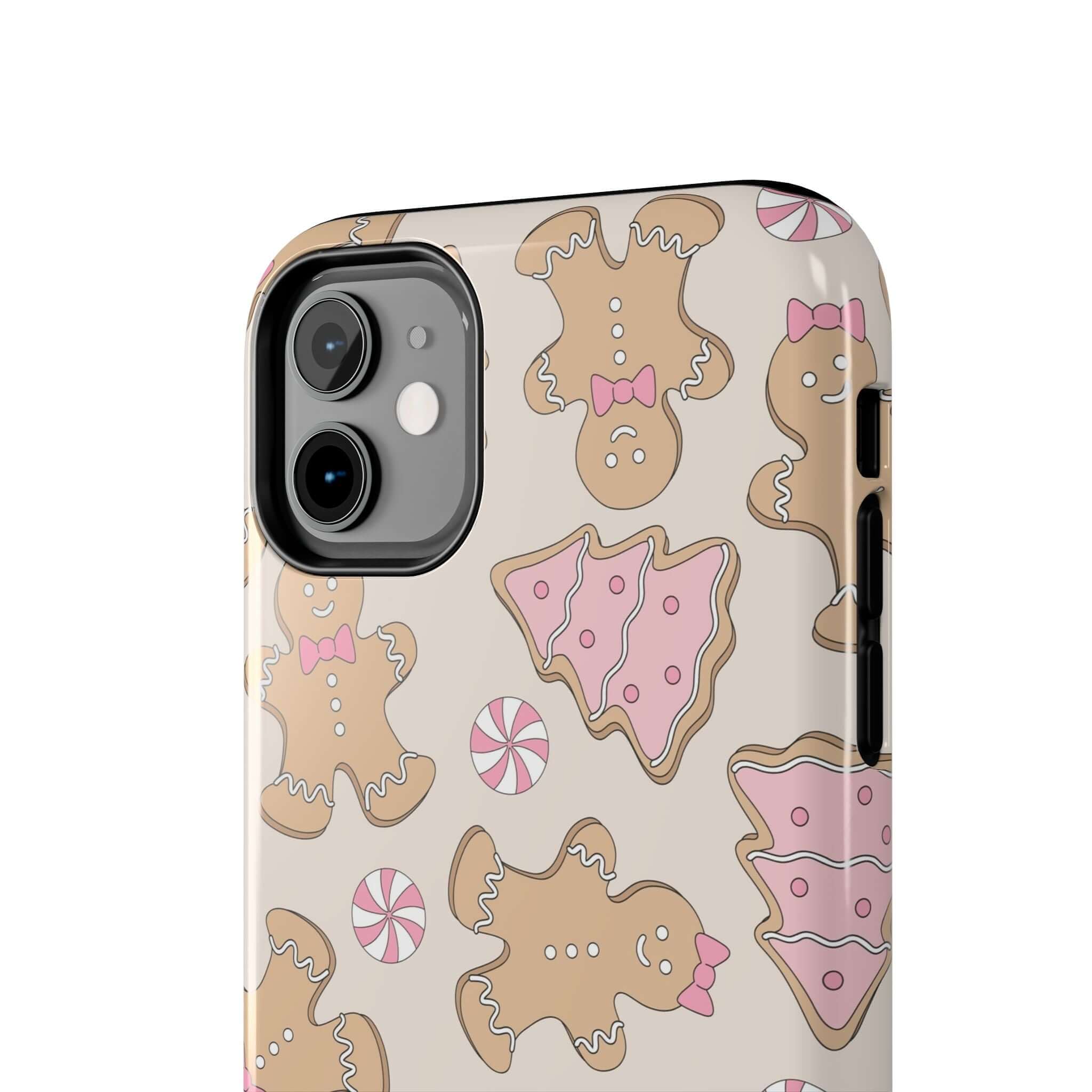 Cute Gingerbread Girlie iPhone case with festive Christmas design, featuring colorful gingerbread cookies and holiday patterns.