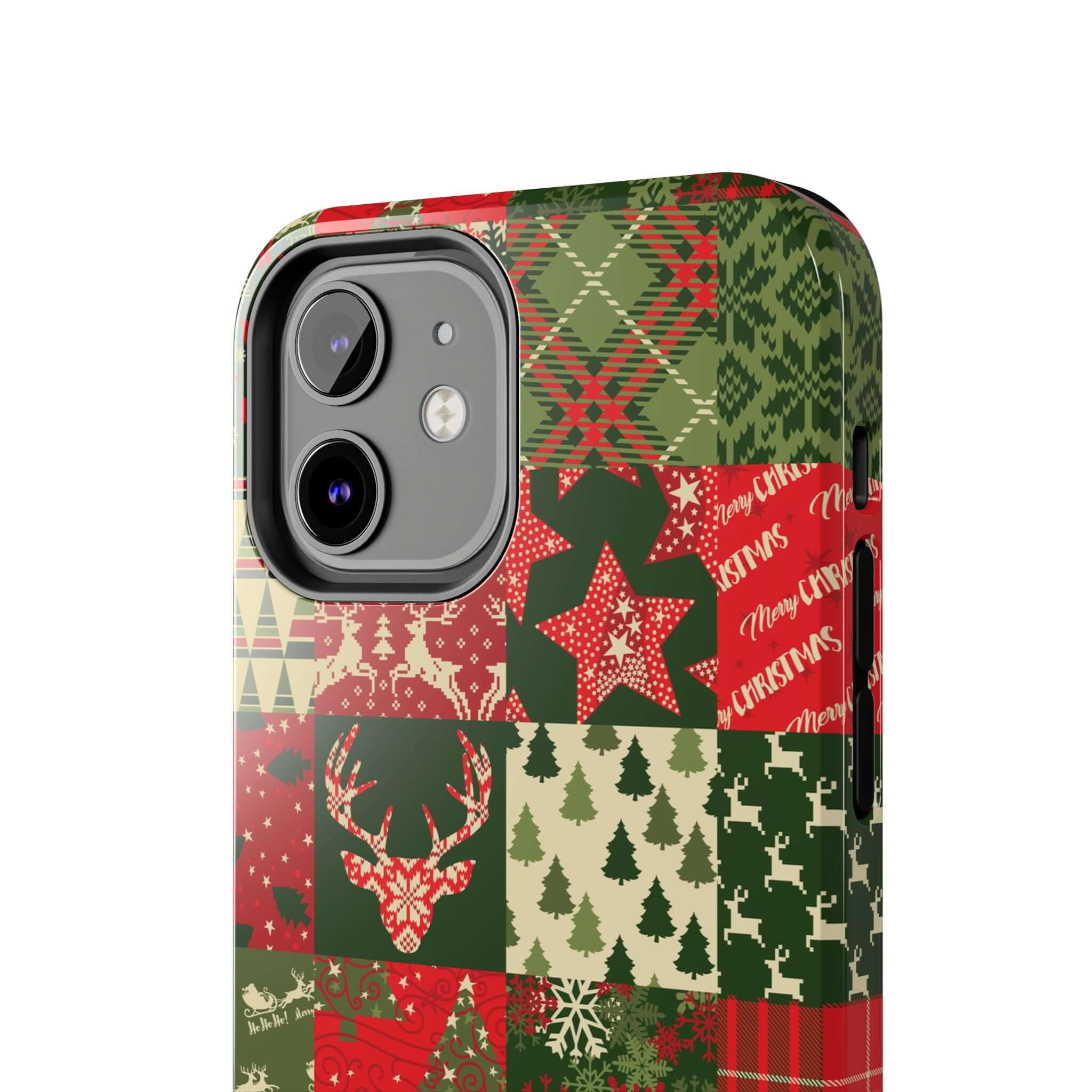 Cute iPhone case with green holiday design featuring Christmas trees, reindeer, and snowflakes by Cozy Quiltmas.