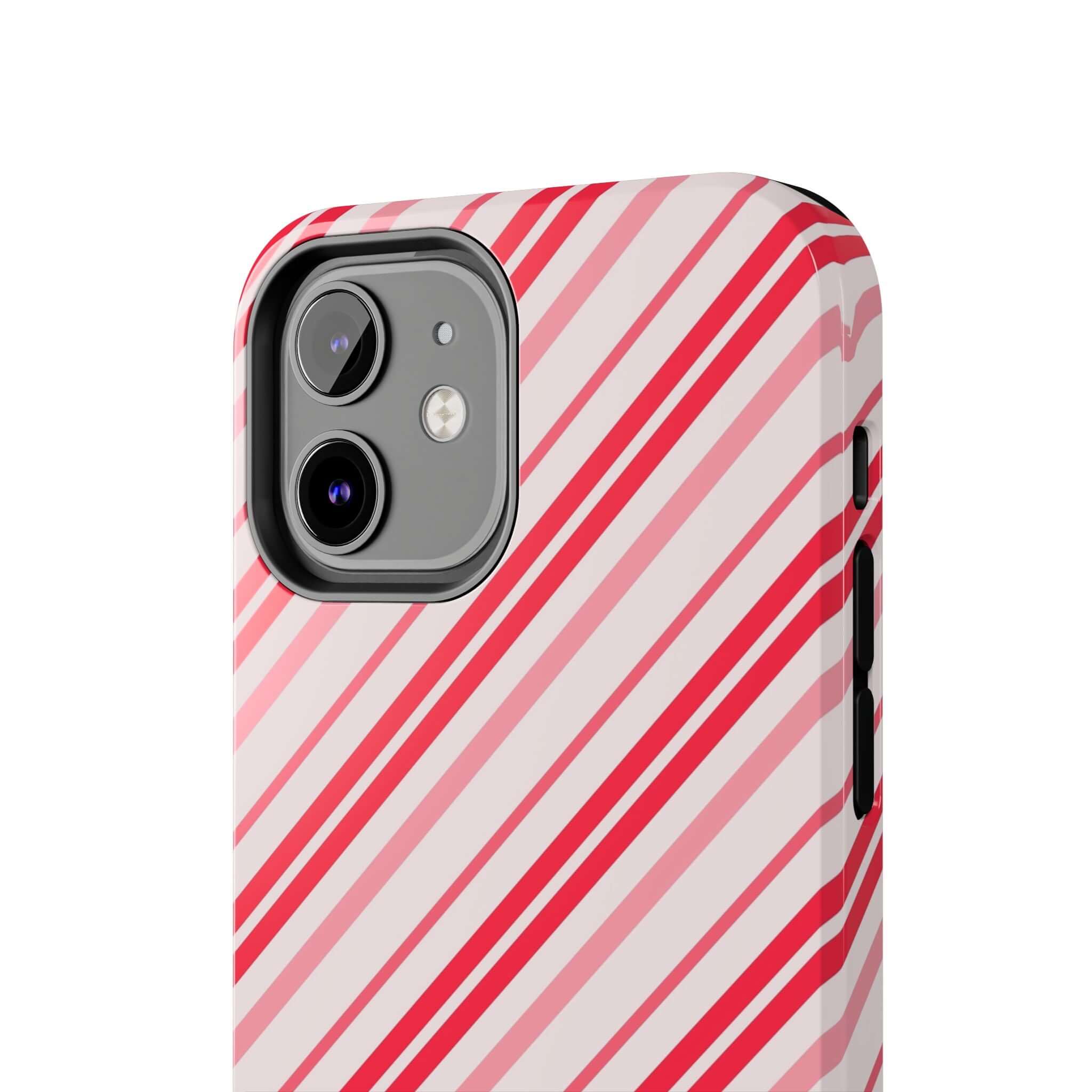 Cute striped holiday phone case with red and pink candy cane design for iPhone. Perfect custom Christmas gift accessory.