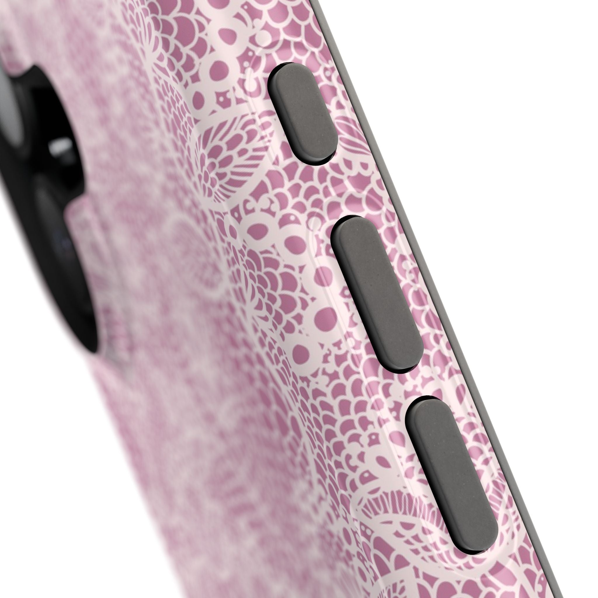 Close-up of a cute pink lace MagSafe iPhone case with floral design and buttons. Stylish country charm phone cover.