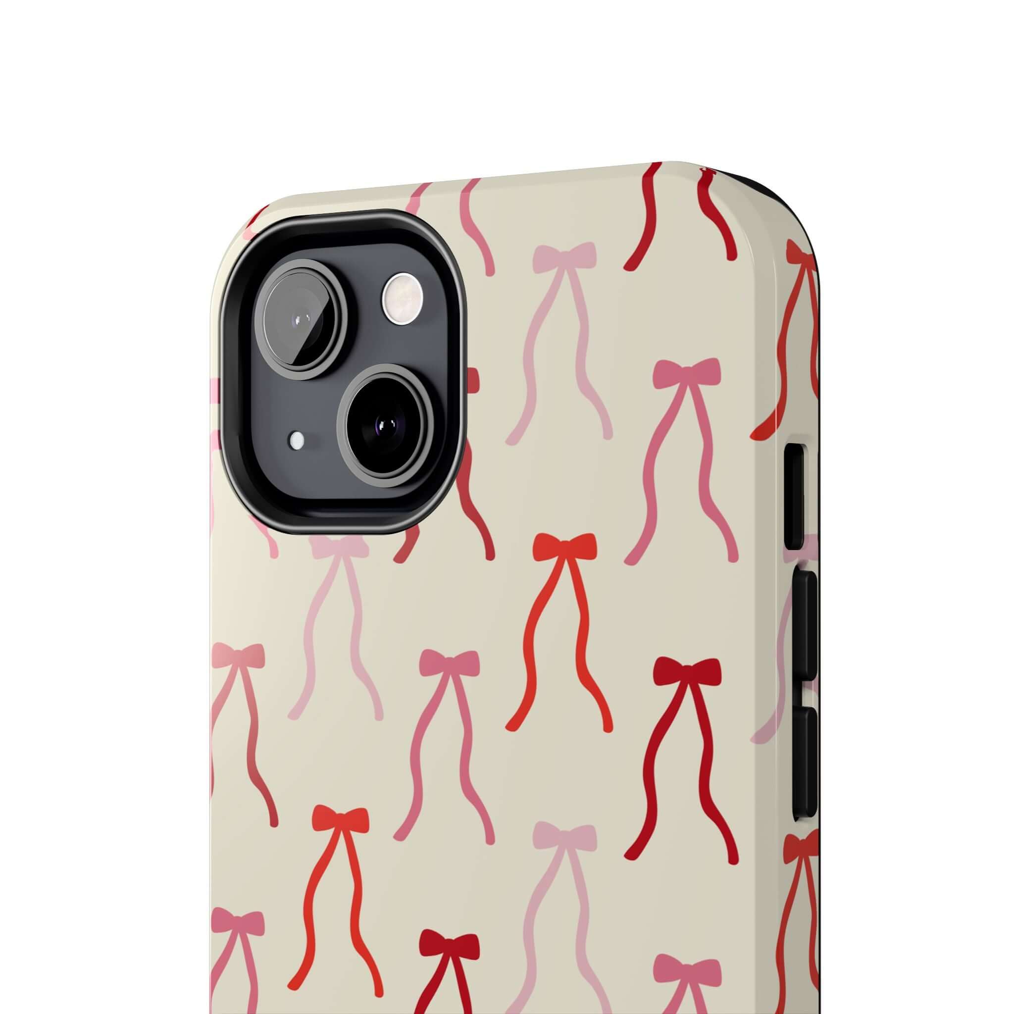 Cute phone case for iPhone 16 with beige base and vibrant red coquette bow design, offering stylish protection.