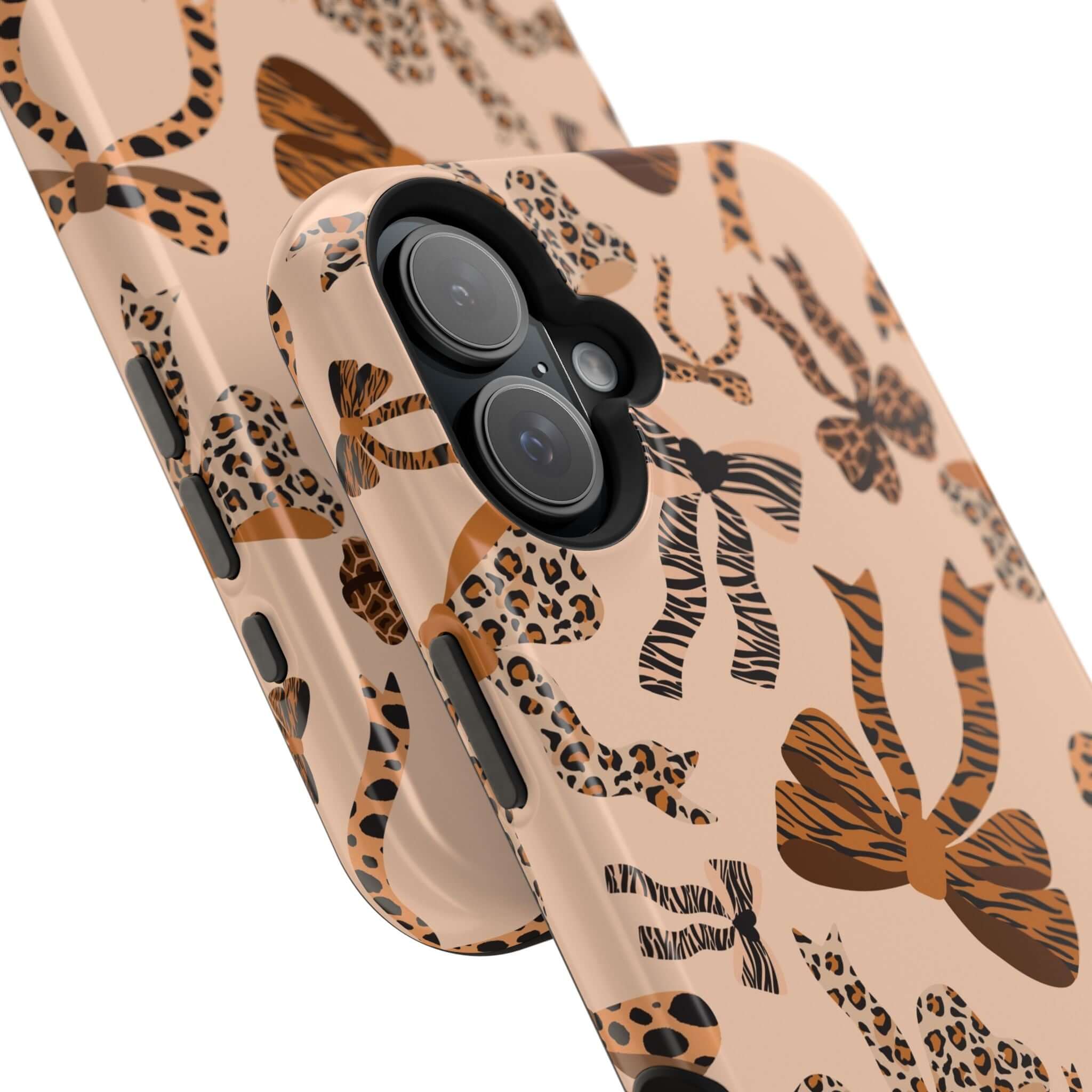 Colorful iPhone case with leopard pattern and cute bows, abstract and playful design for a stylish phone accessory.