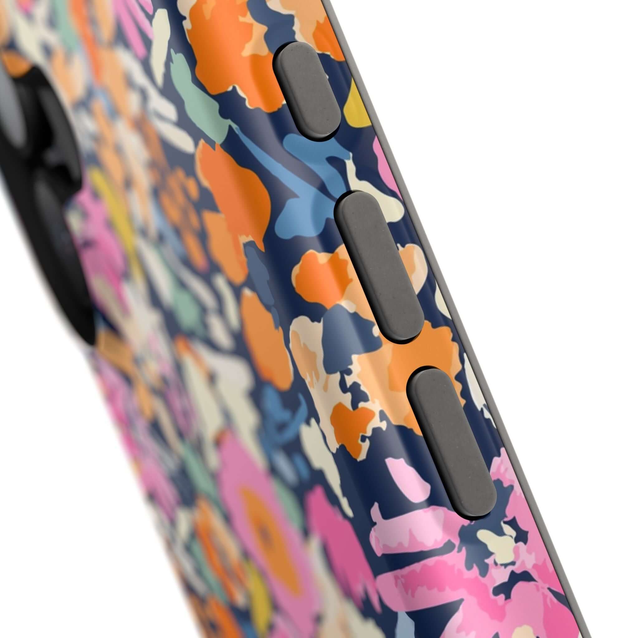 Close-up of Botanic Burst colorful floral MagSafe iPhone 16 case with vibrant flower design and protective buttons.